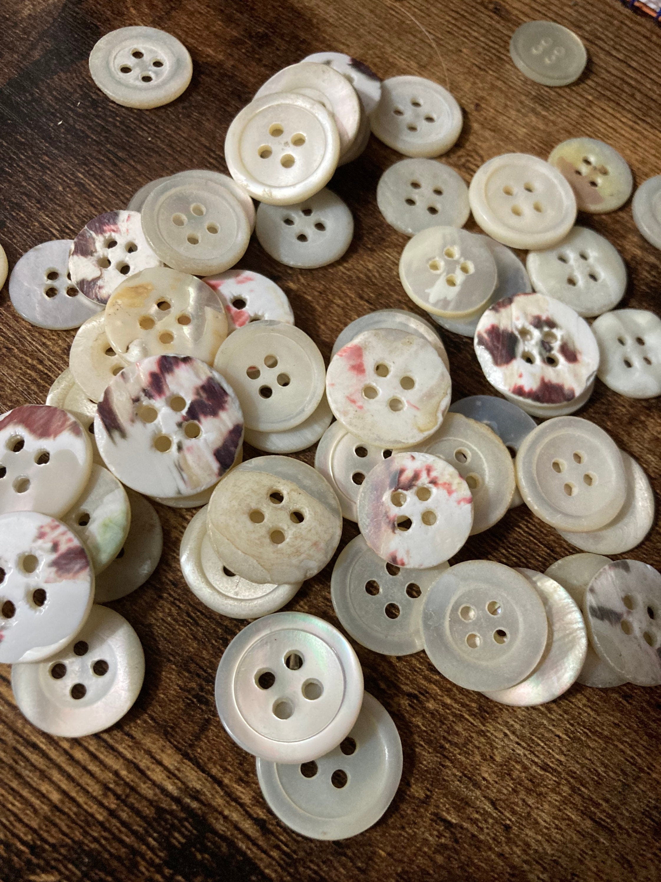 Job lot of 62 true antique vintage mother of Pearl buttons MOP shell medium 4 holes round