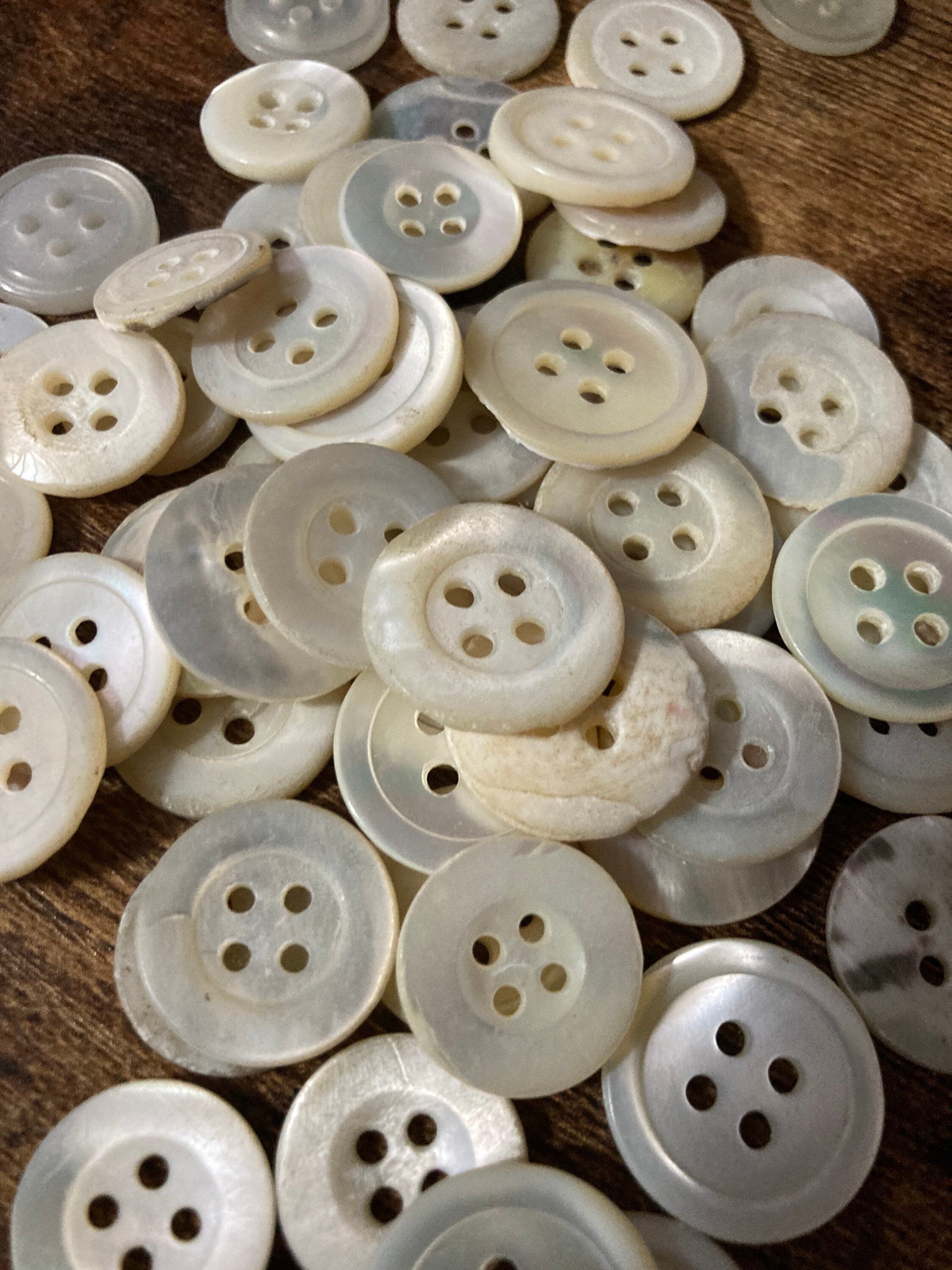 Job lot of 62 true antique vintage mother of Pearl buttons MOP shell medium 4 holes round