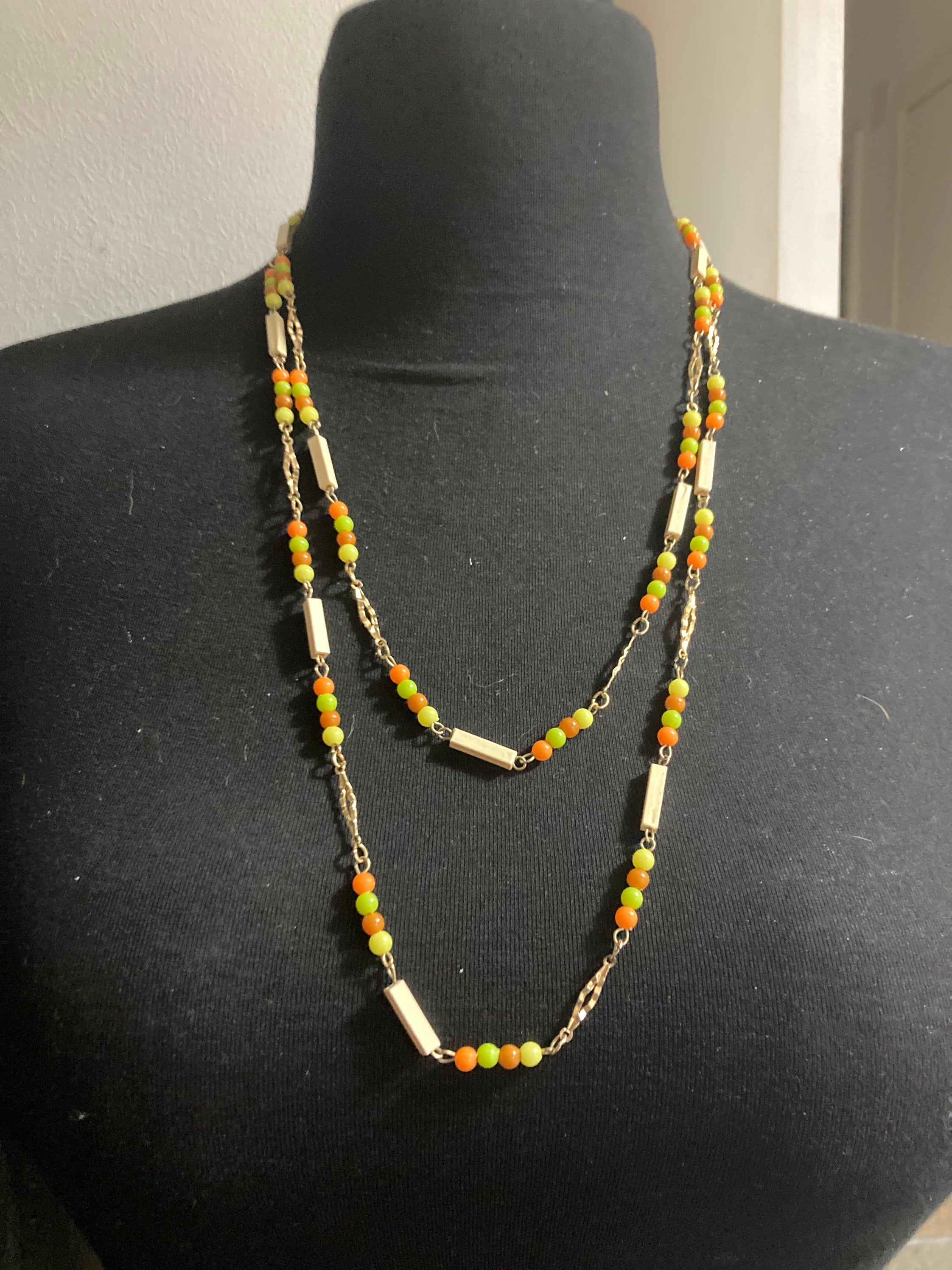 beaded flapper necklace bright orange and yellow plastic beads 140cm