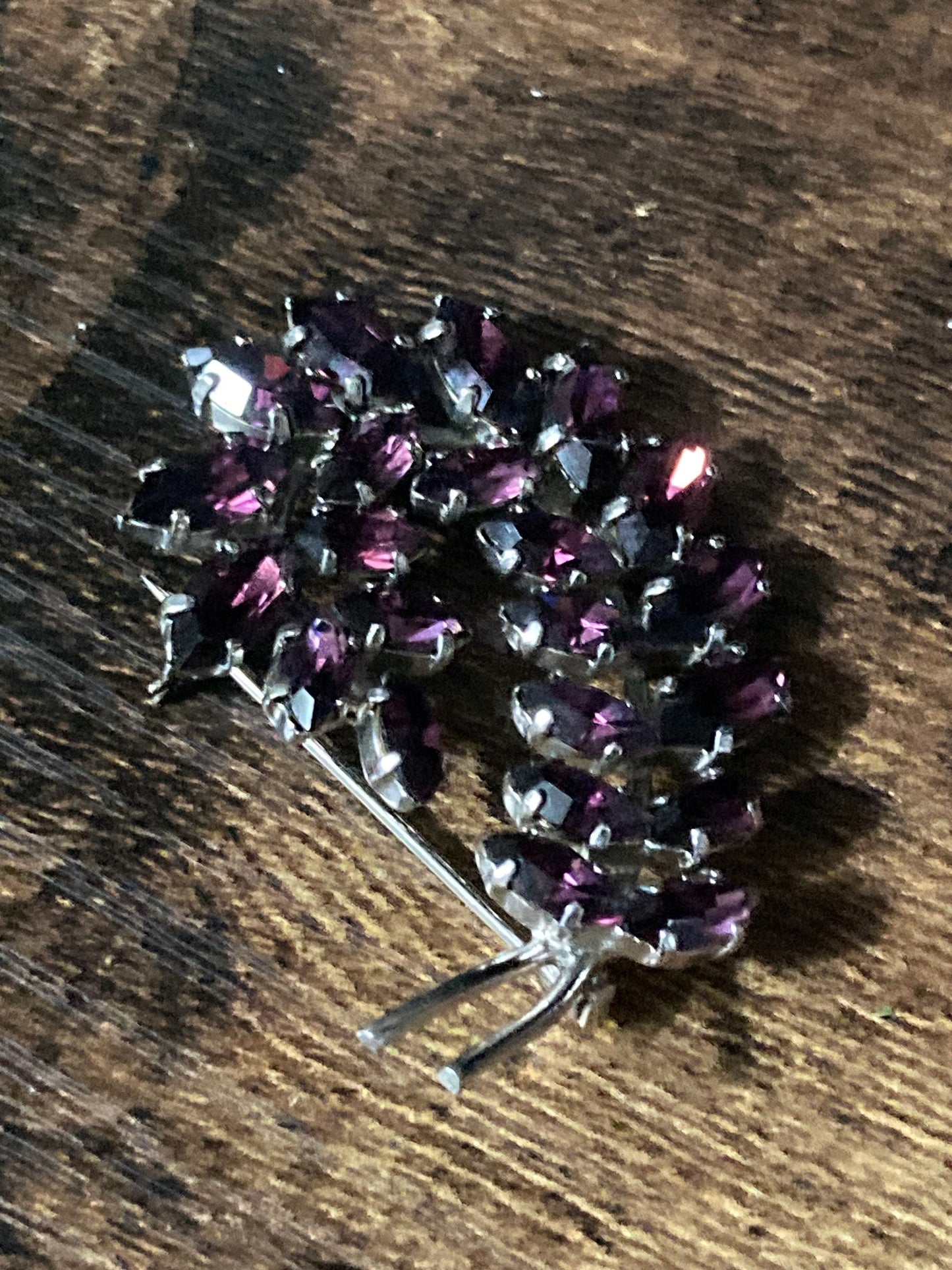 Silver tone fern leaf brooch with amethyst purple rhinestone glass
