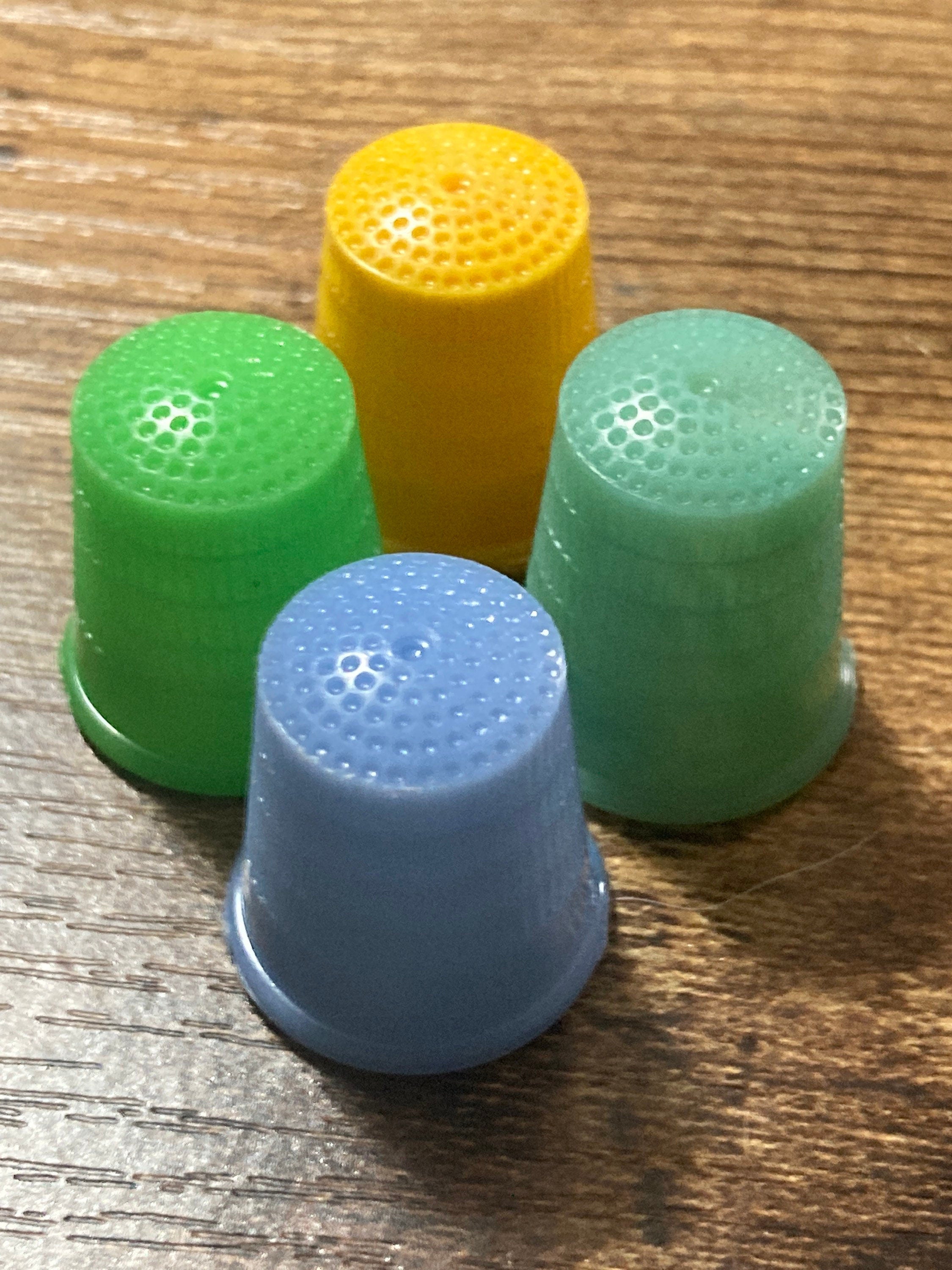 set of 4 Art Deco galalith early plastic coloured sewing thimbles Size S small