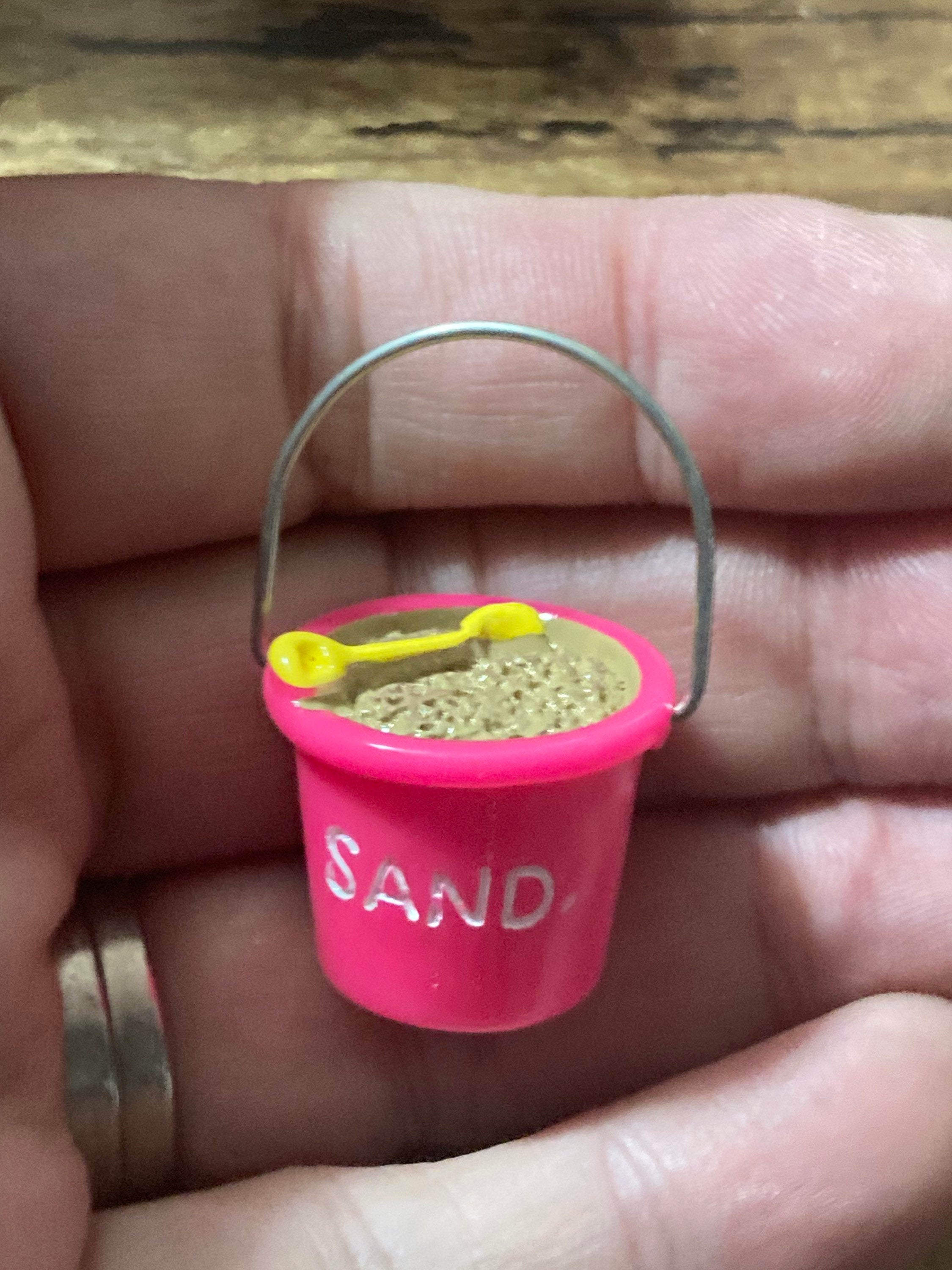 Doll’s house or cake topper miniature sand bucket and spade decoration seaside nautical scenery