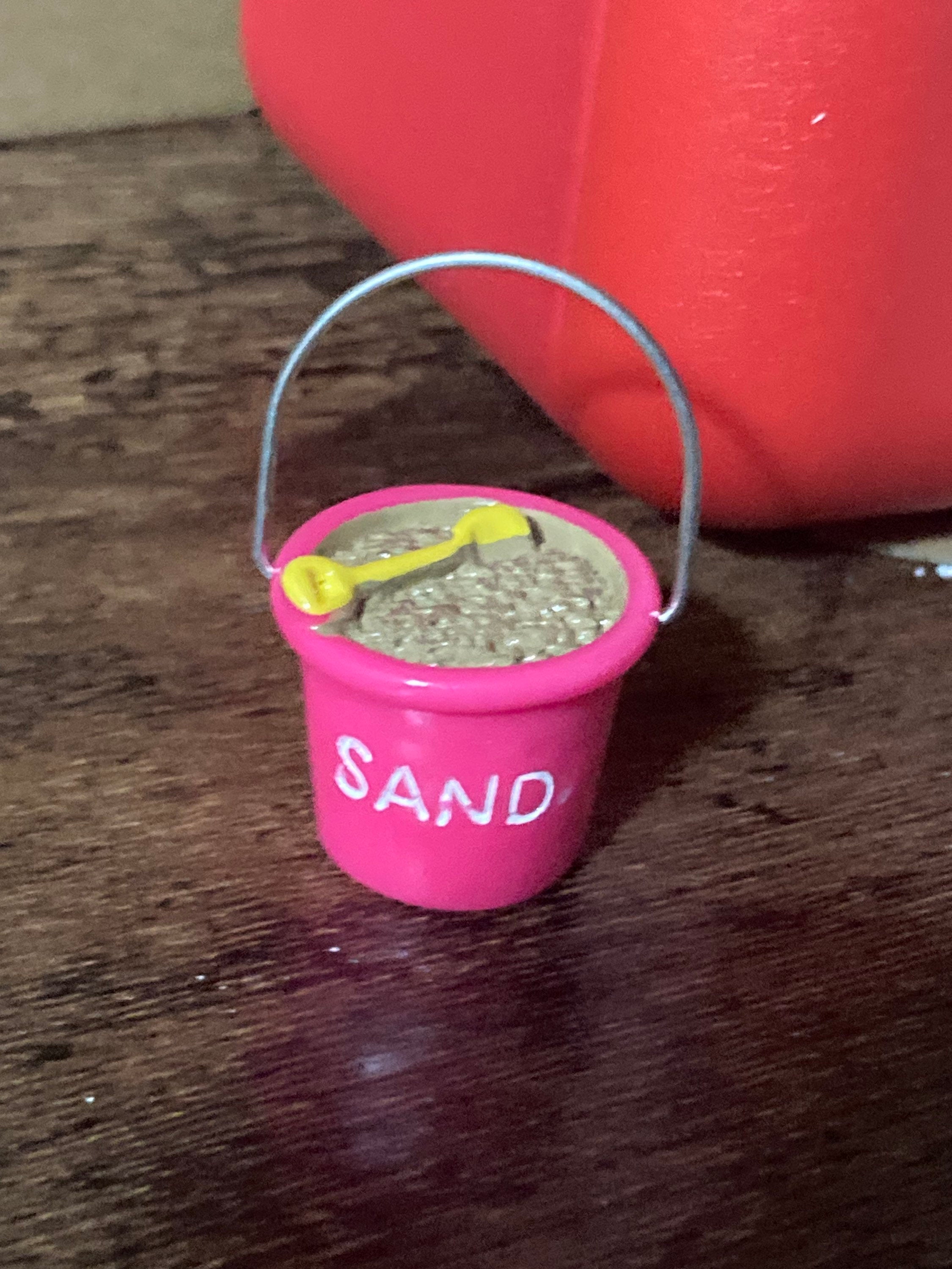 Doll’s house or cake topper miniature sand bucket and spade decoration seaside nautical scenery