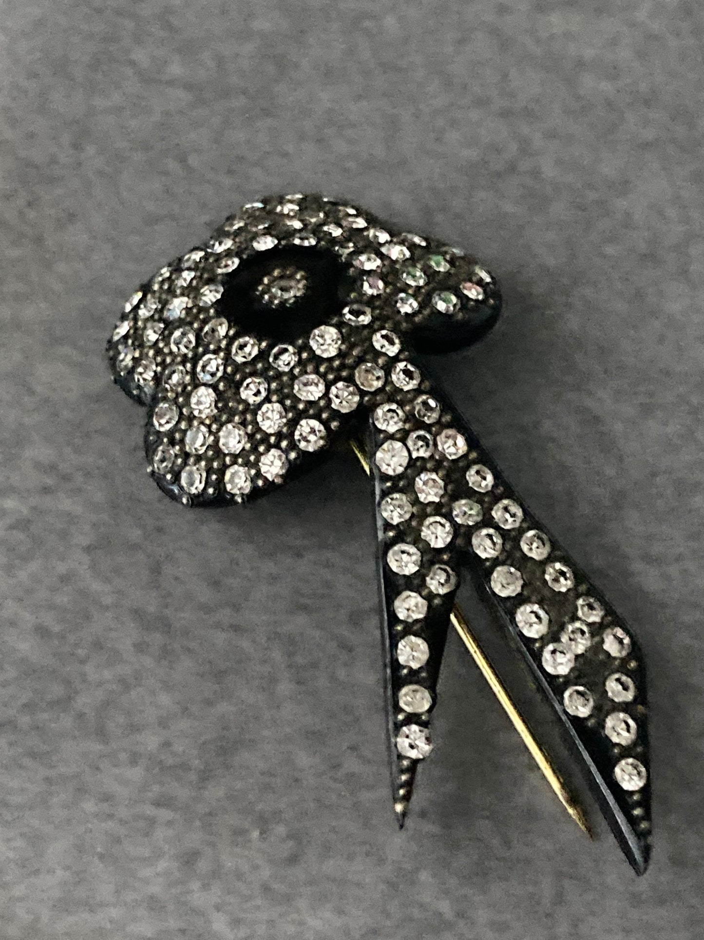 Art Deco floral hat flash pin diamante paste set black bakelite or early plastic