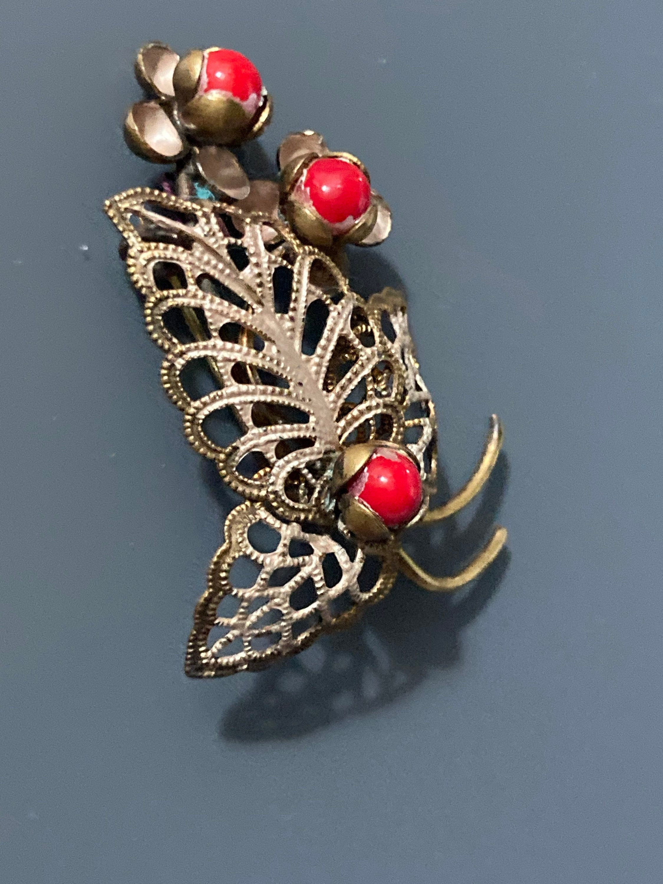 Art Deco Czech brass metal leaf brooch with faux red coral glass cabochon