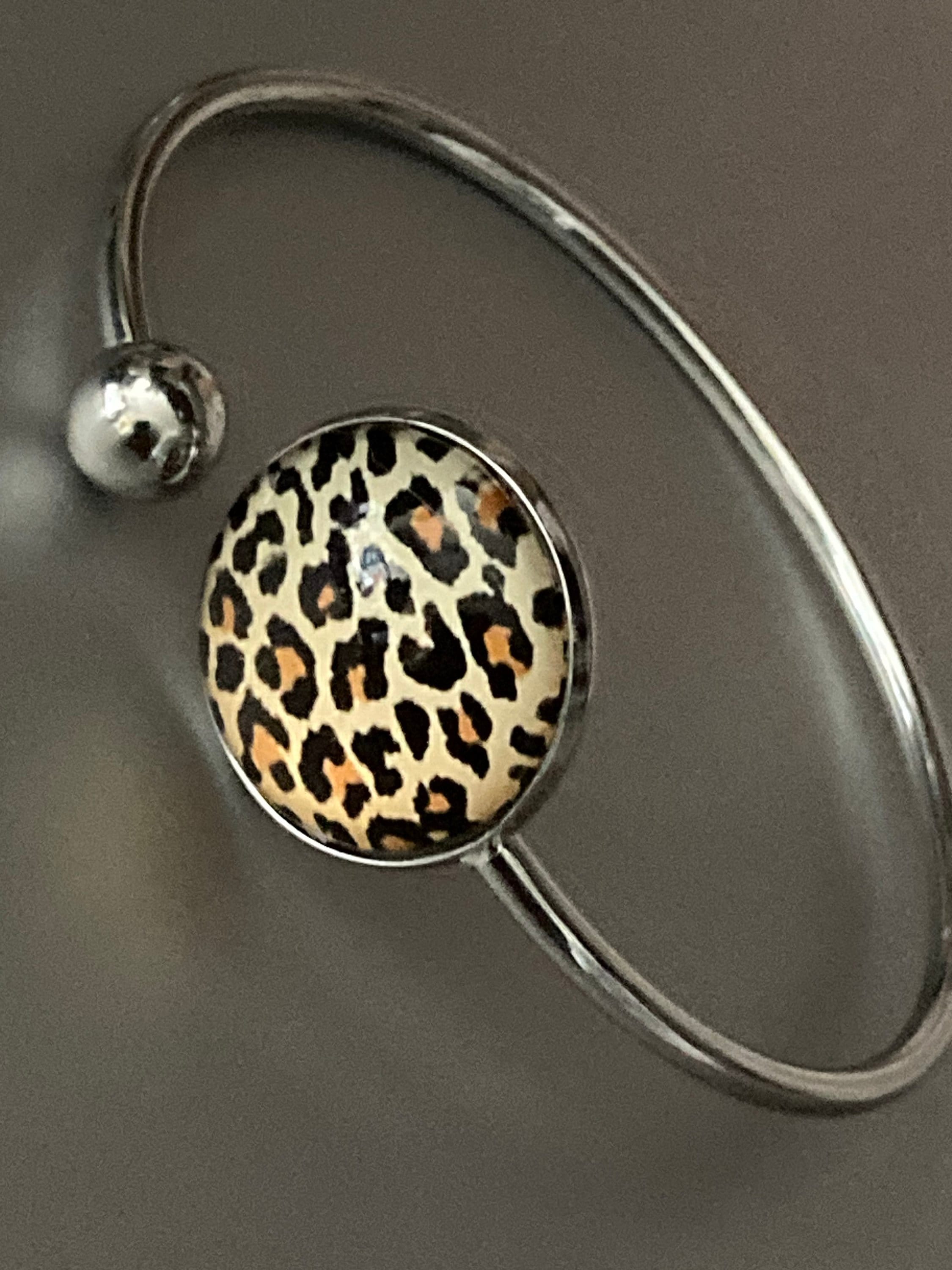 Leopard print stainless steel glass cabochon bangle bracelet