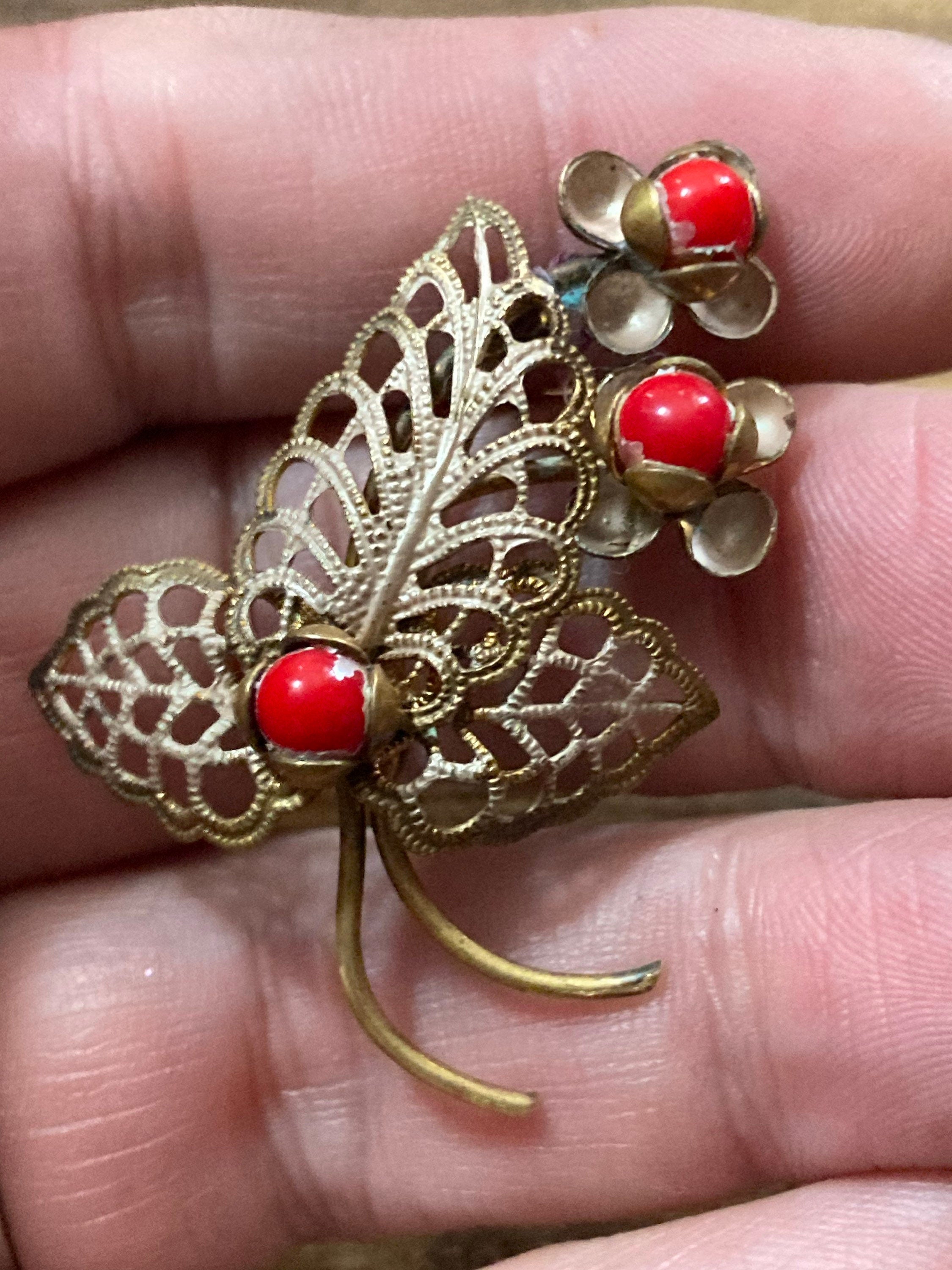 Art Deco Czech brass metal leaf brooch with faux red coral glass cabochon