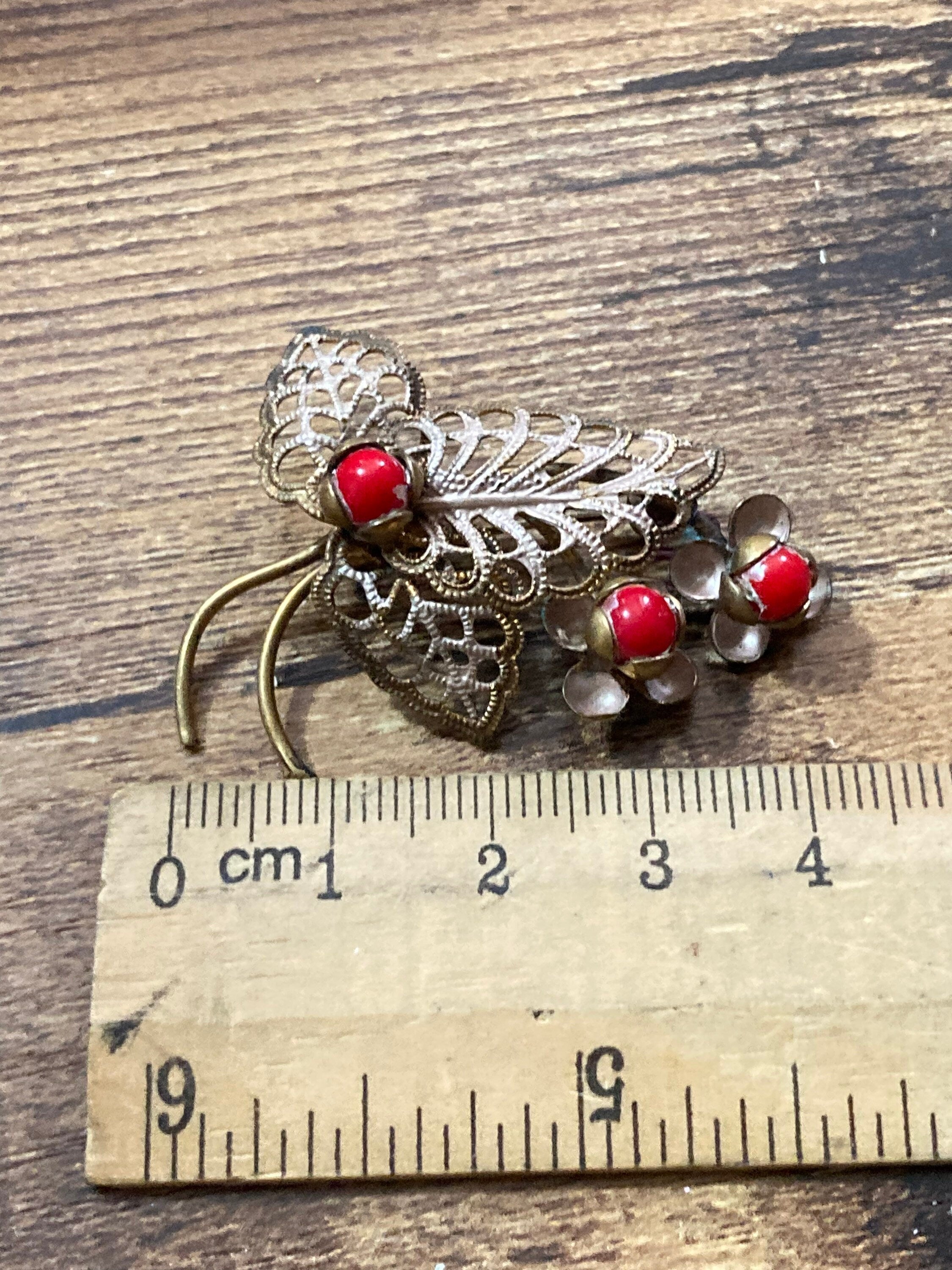 Art Deco Czech brass metal leaf brooch with faux red coral glass cabochon