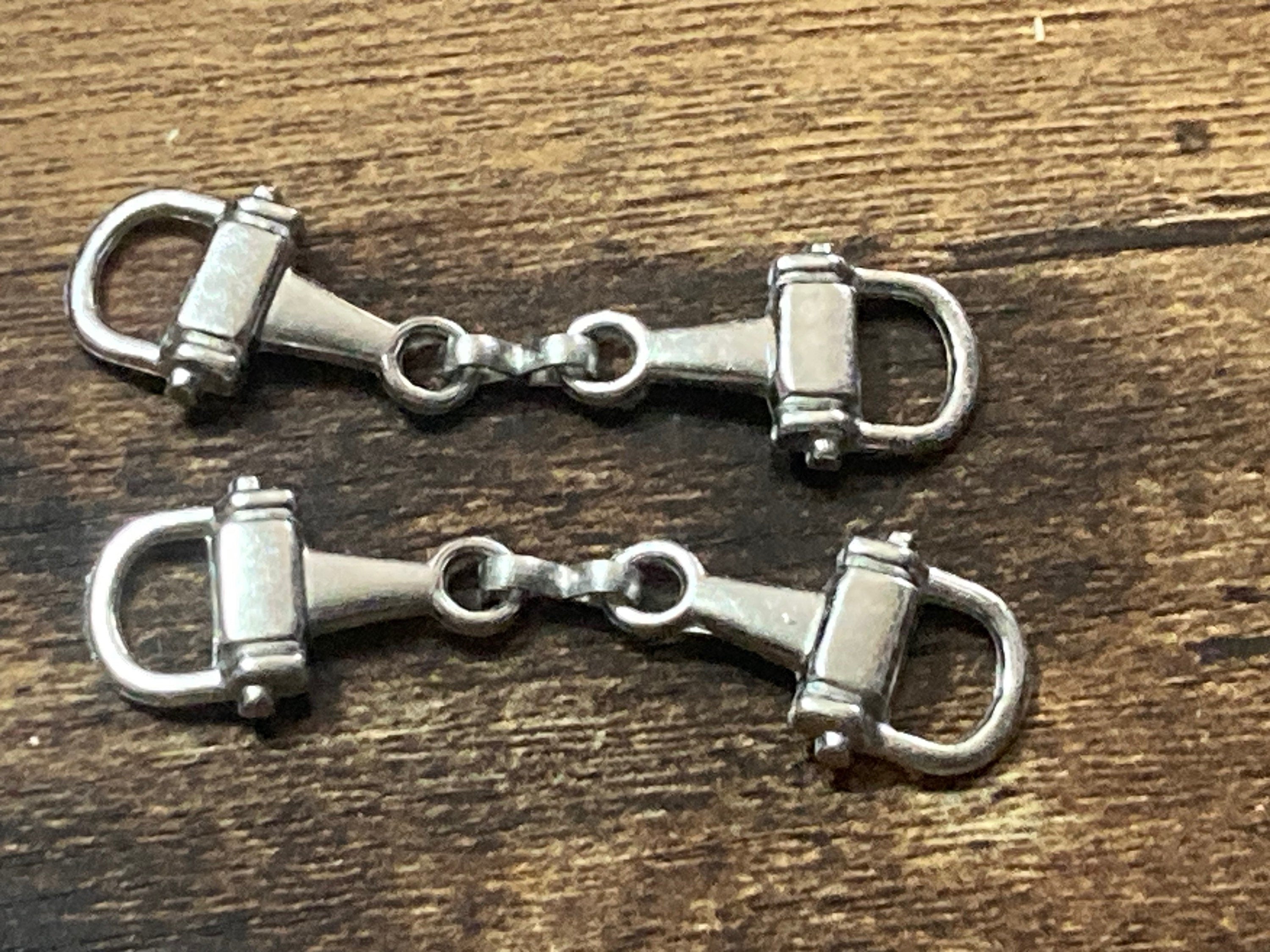 Pair of sew on silver tone snaffle horse bit shoe buckles embellishments