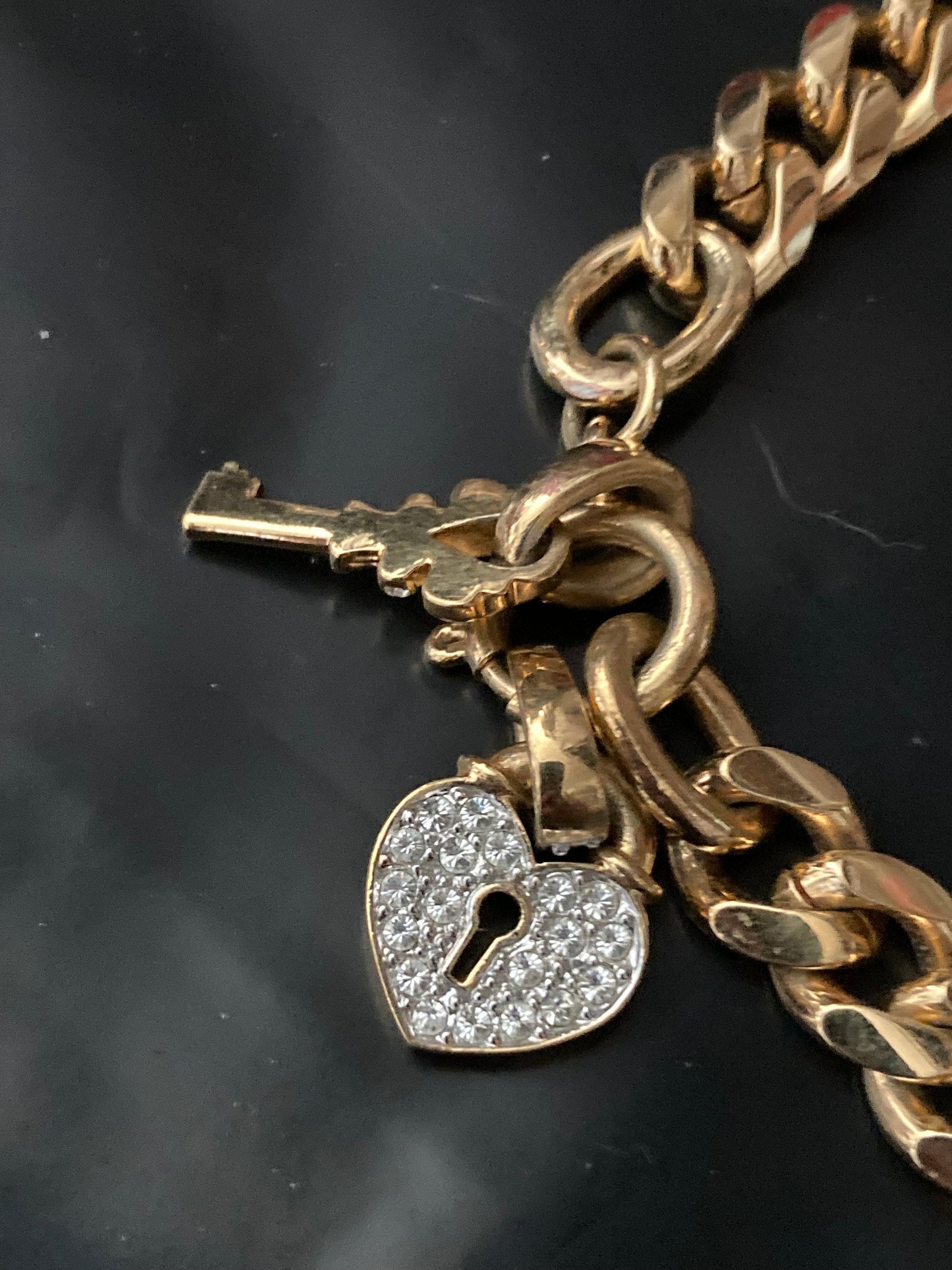 High end heavy gold plated chain link curb bracelet with diamanté heart and key charm