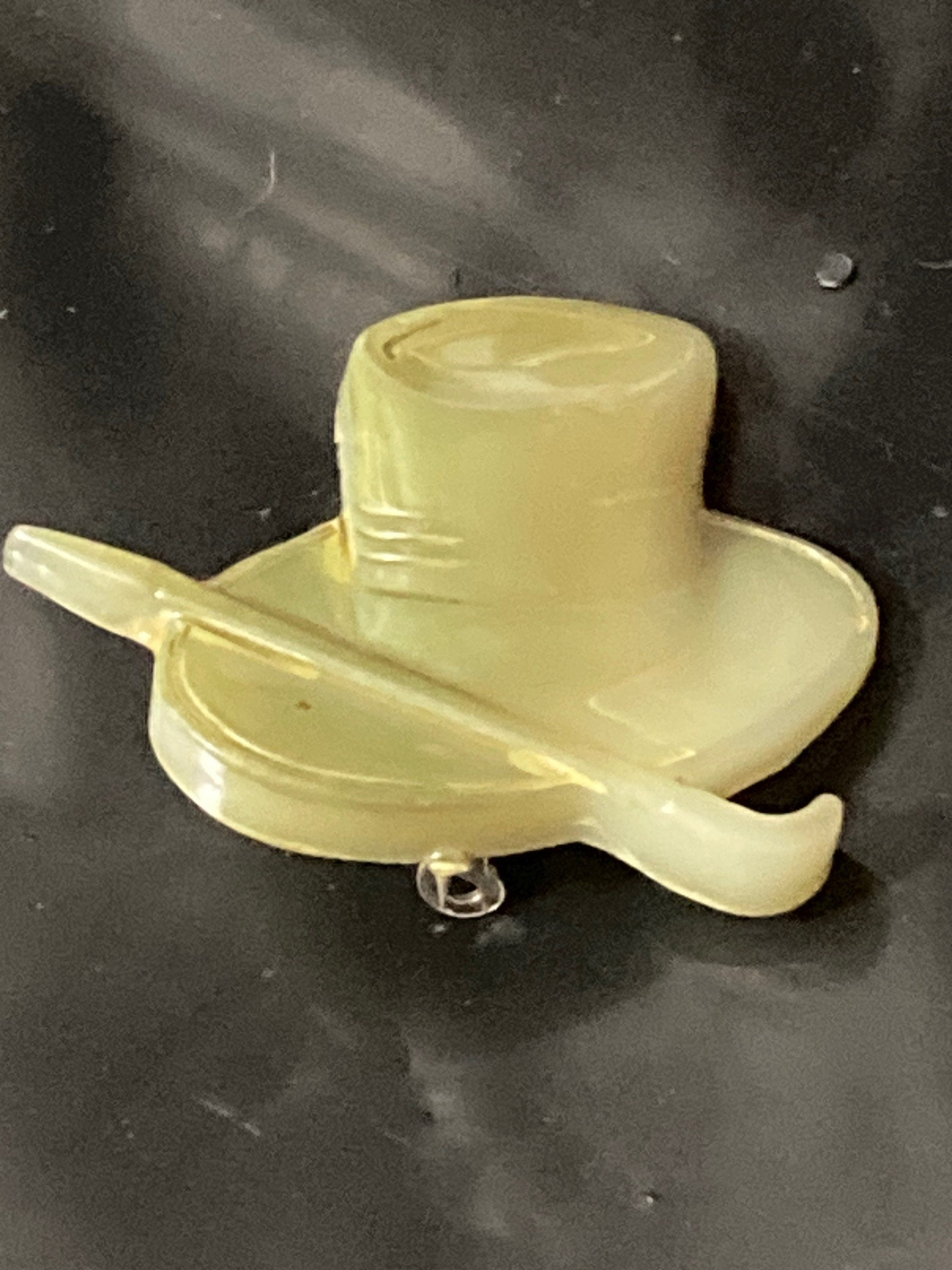 Early Plastic Celluloid Art Deco green mens top hat and cane brooch