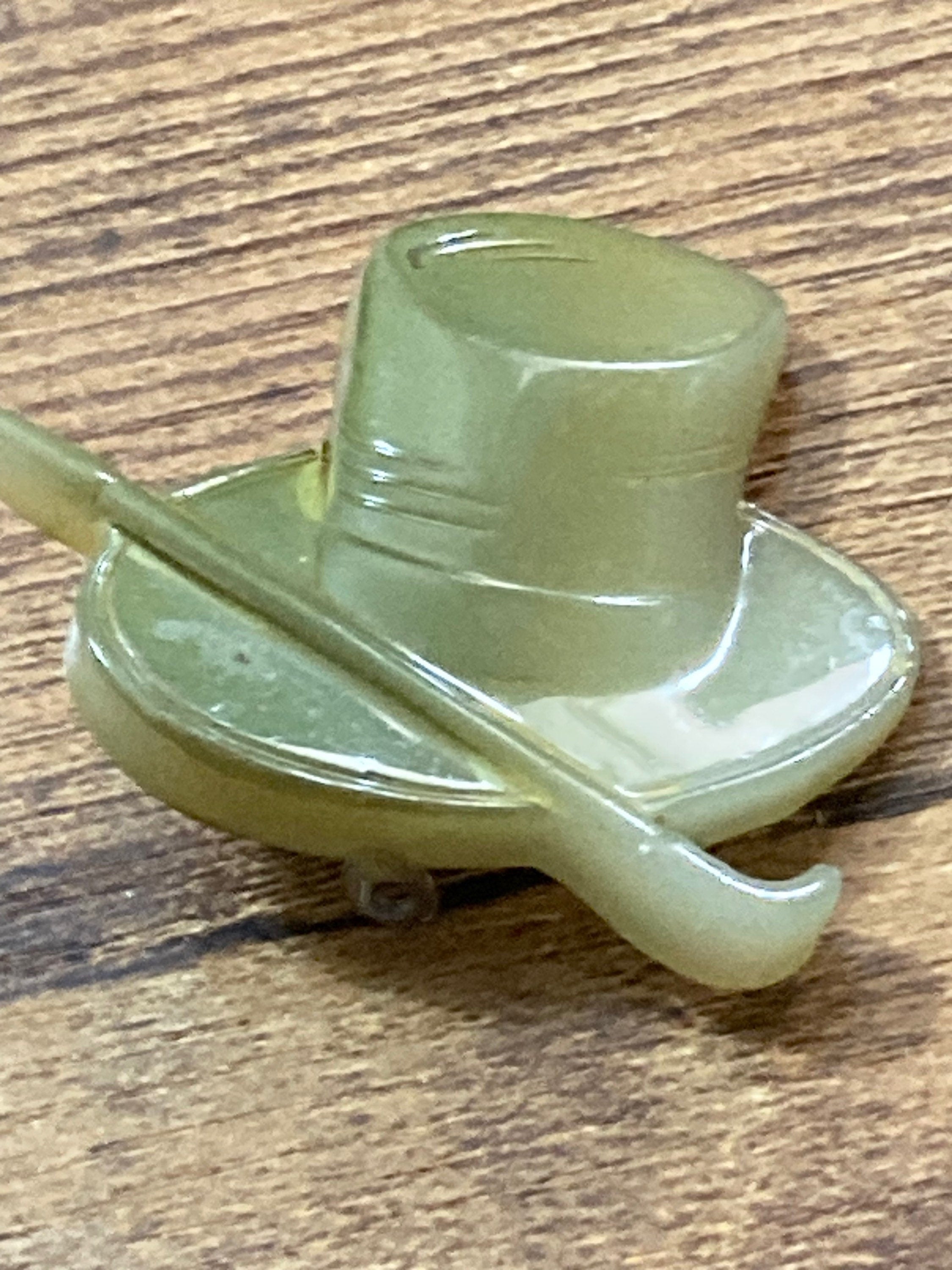 Early Plastic Celluloid Art Deco green mens top hat and cane brooch