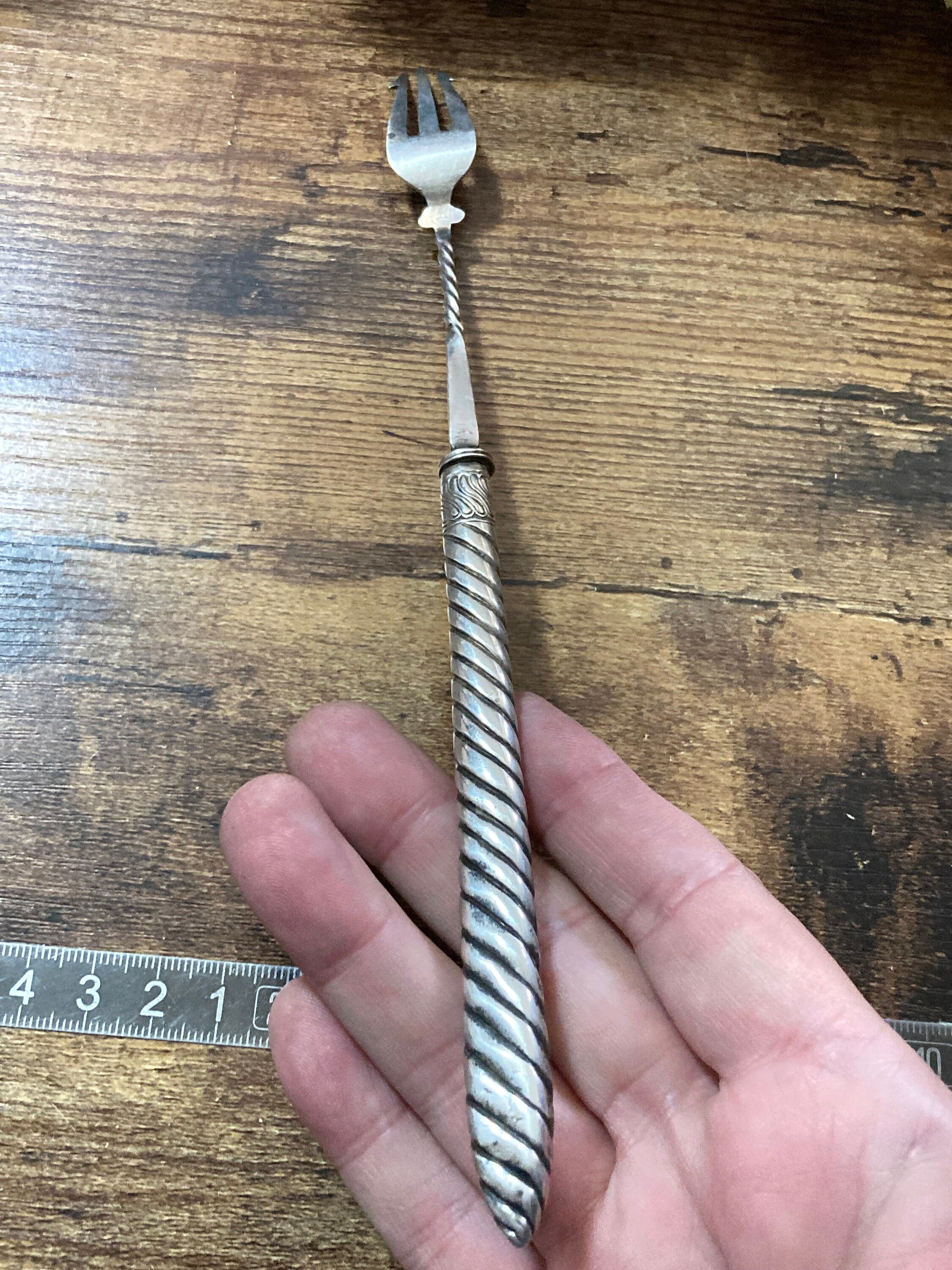 Unmarked silver white metal pickle fork