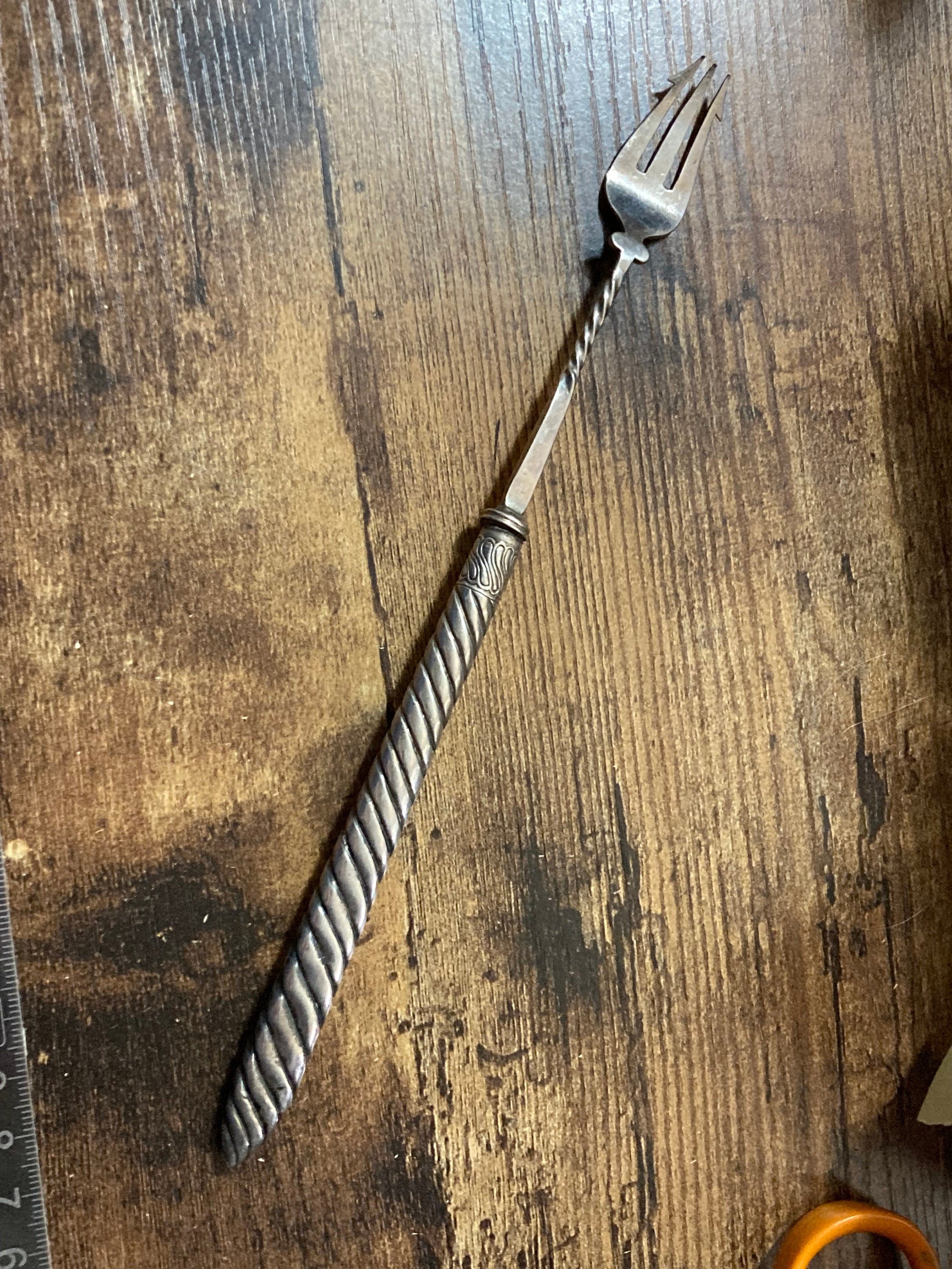 Unmarked silver white metal pickle fork