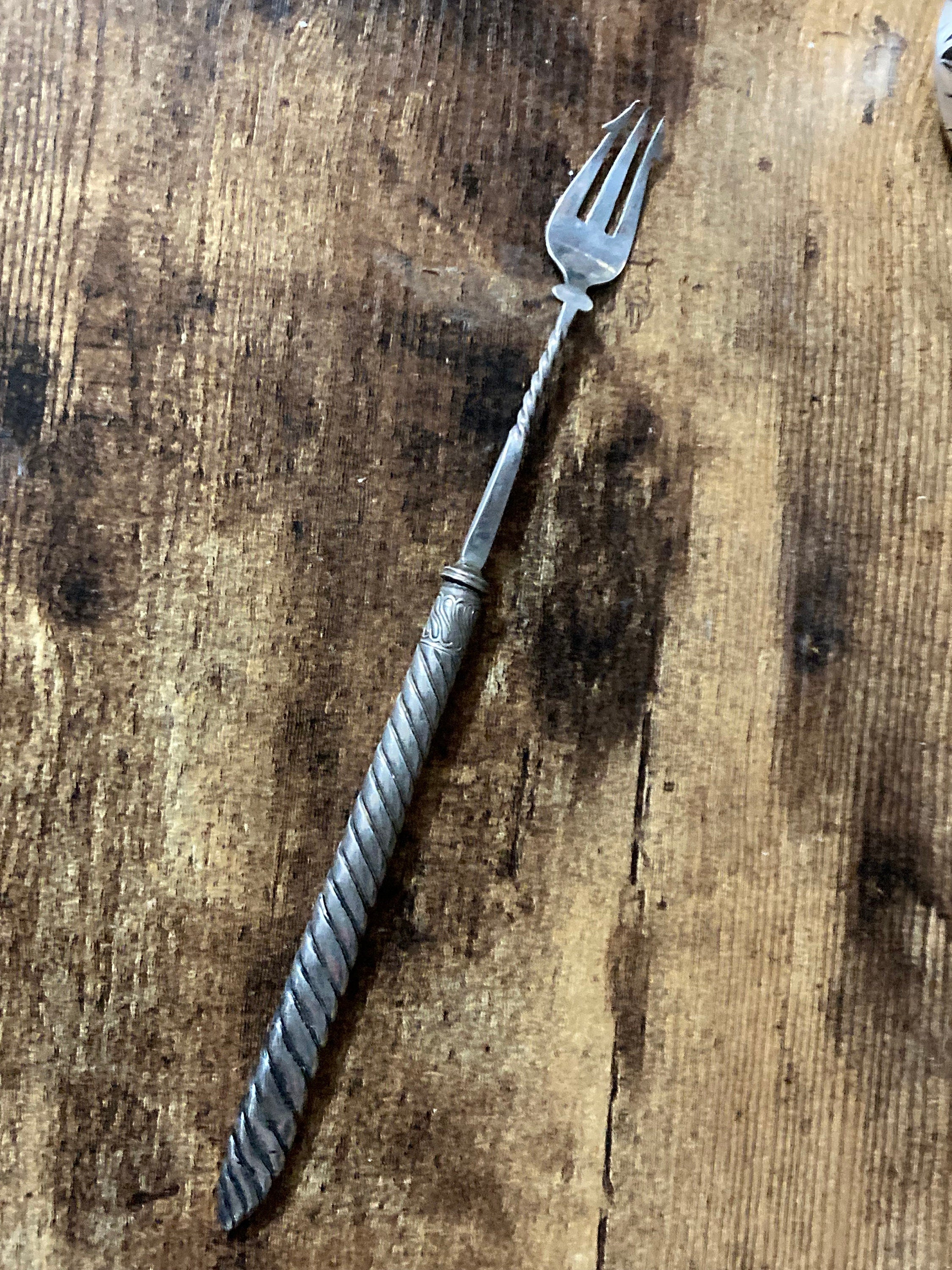 Unmarked silver white metal pickle fork