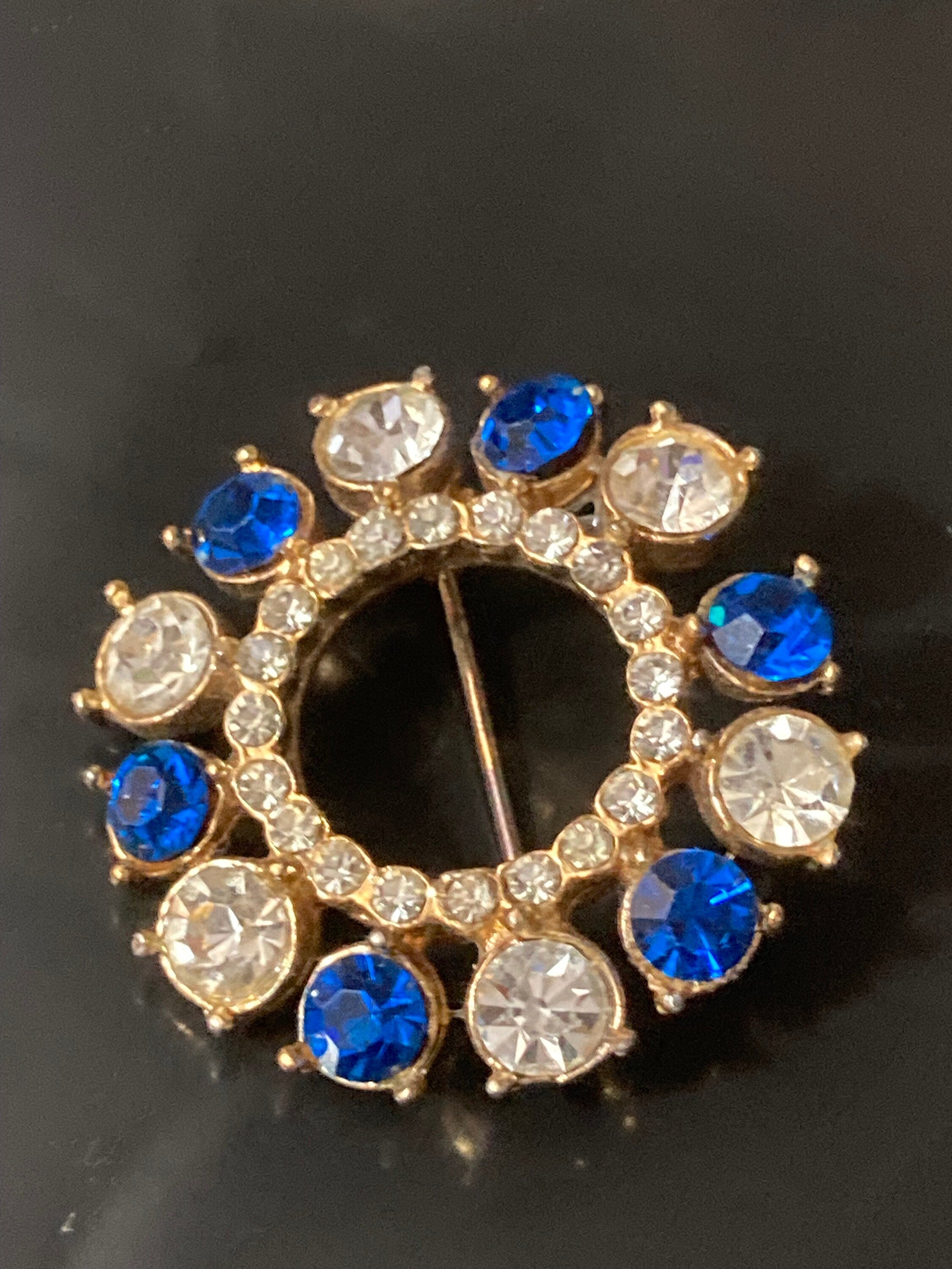 Vintage round rhinestone paste glass Diamanté gold tone Brooch with sapphire blue stones