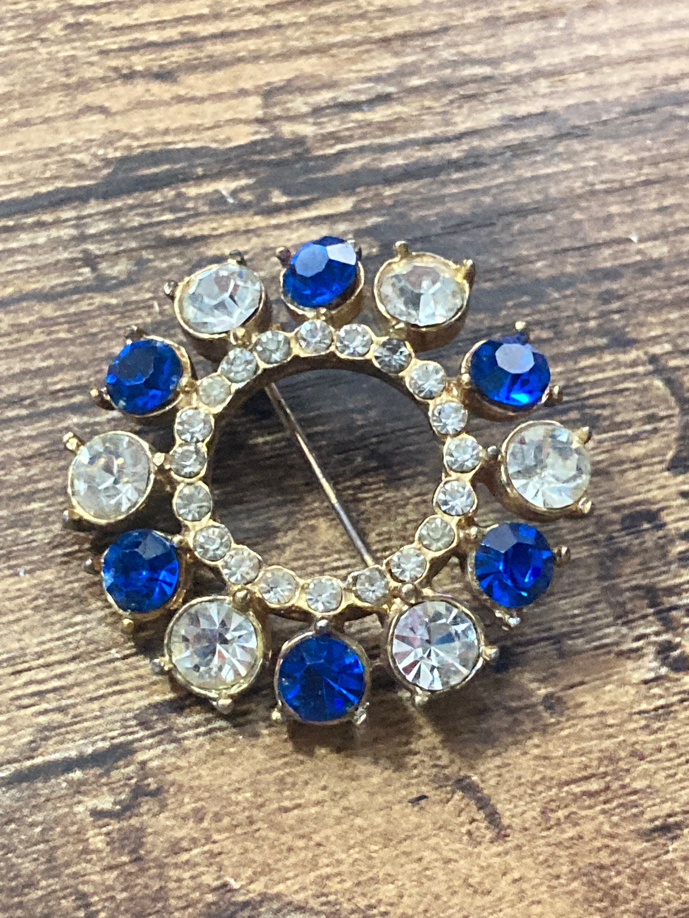 Vintage round rhinestone paste glass Diamanté gold tone Brooch with sapphire blue stones