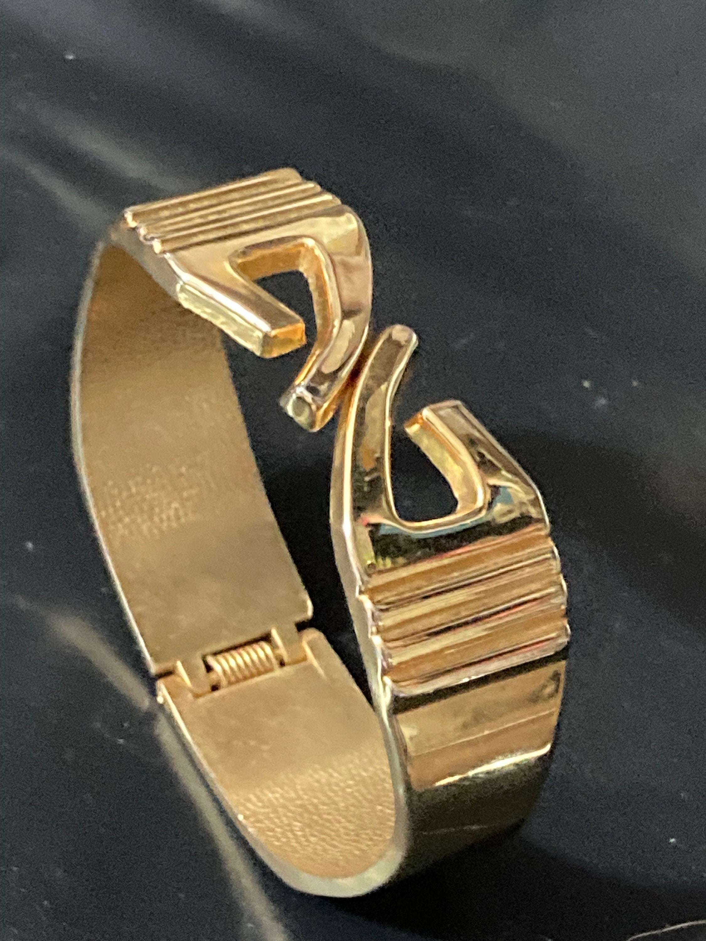 retro modernist style gold tone wide clamper bangle geometric