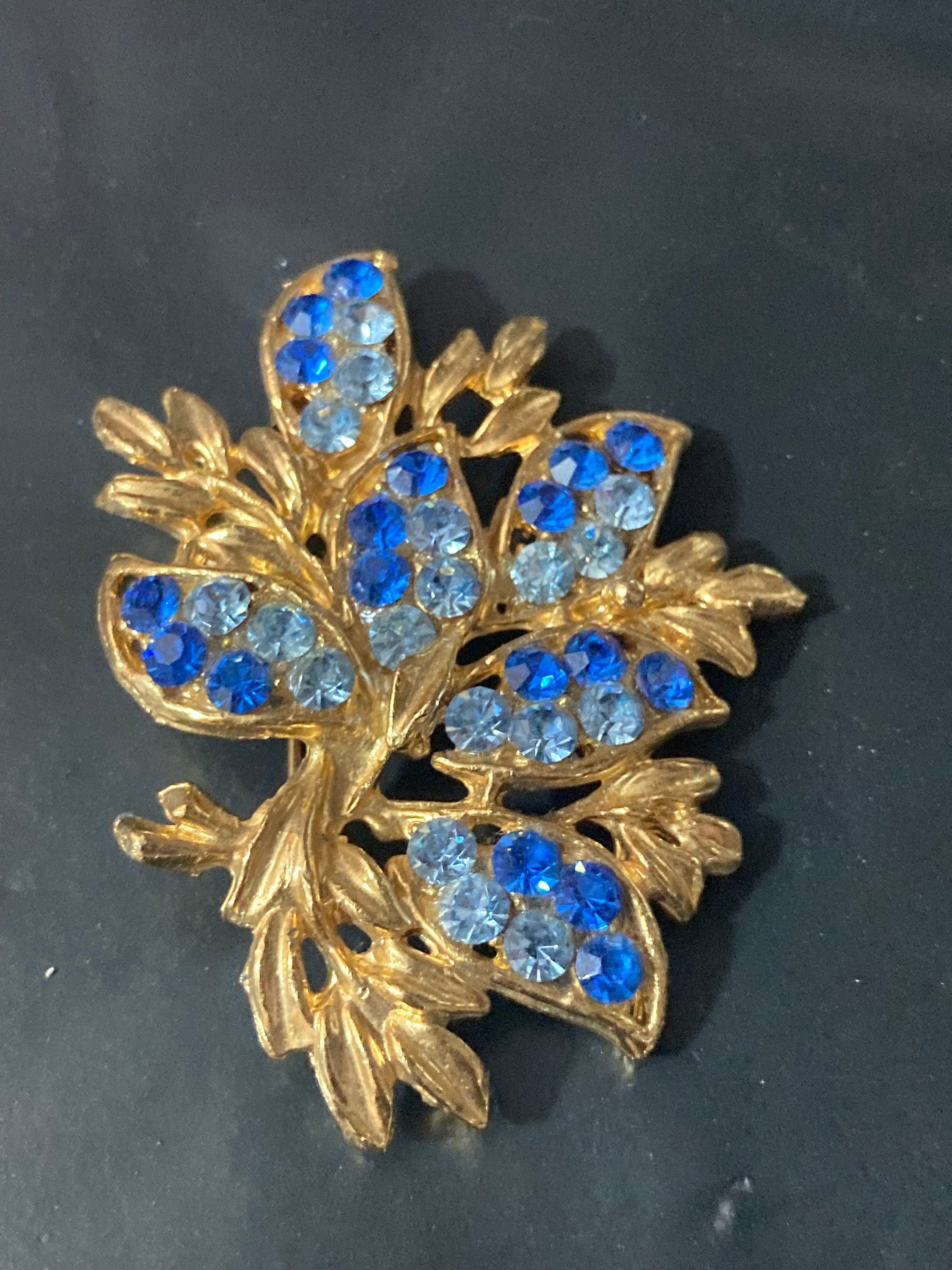 Large Vintage blue Sapphire diamanté gold tone Brooch