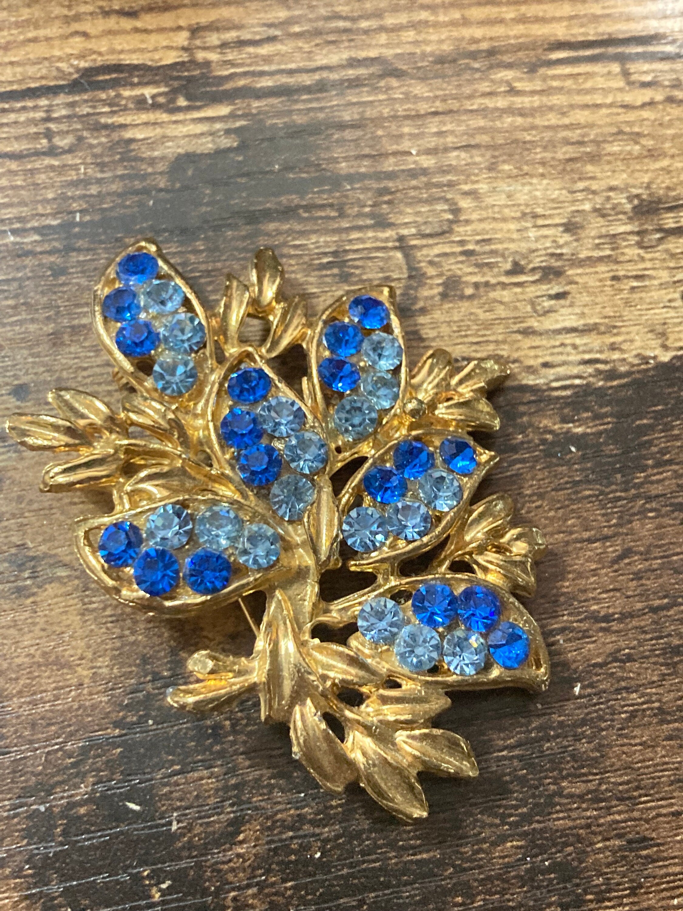 Large Vintage blue Sapphire diamanté gold tone Brooch