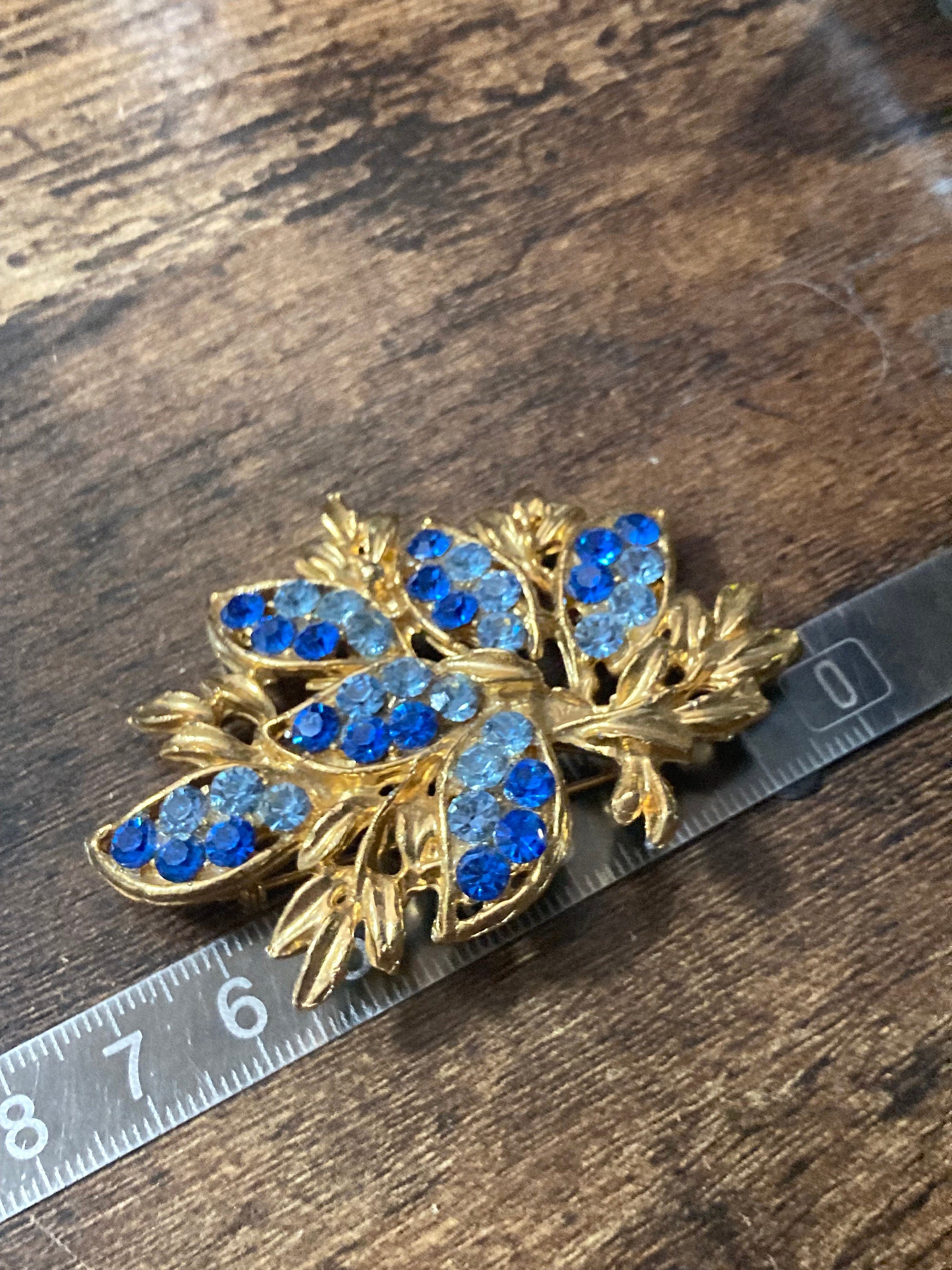 Large Vintage blue Sapphire diamanté gold tone Brooch