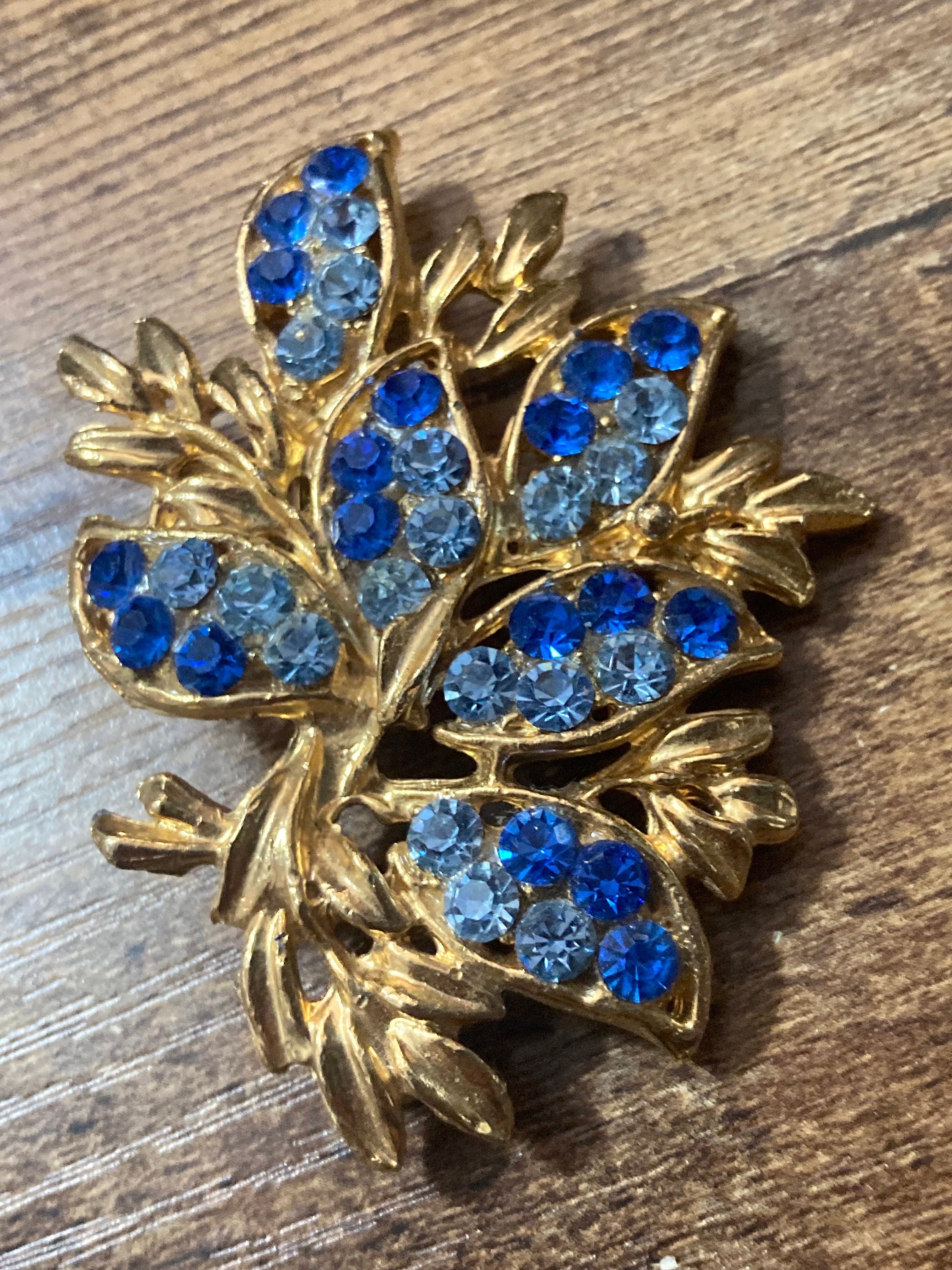 Large Vintage blue Sapphire diamanté gold tone Brooch