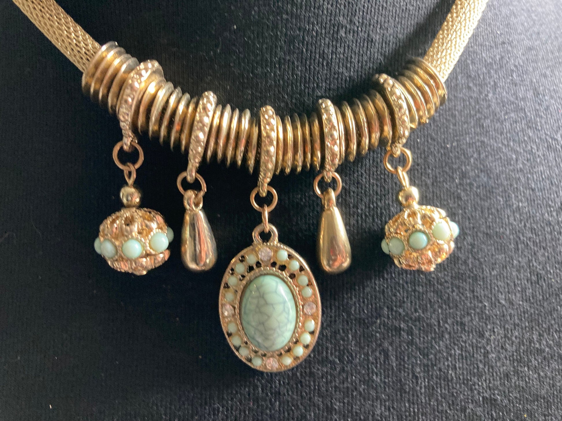 Retro gold tone mesh necklace with turquoise charms with stones