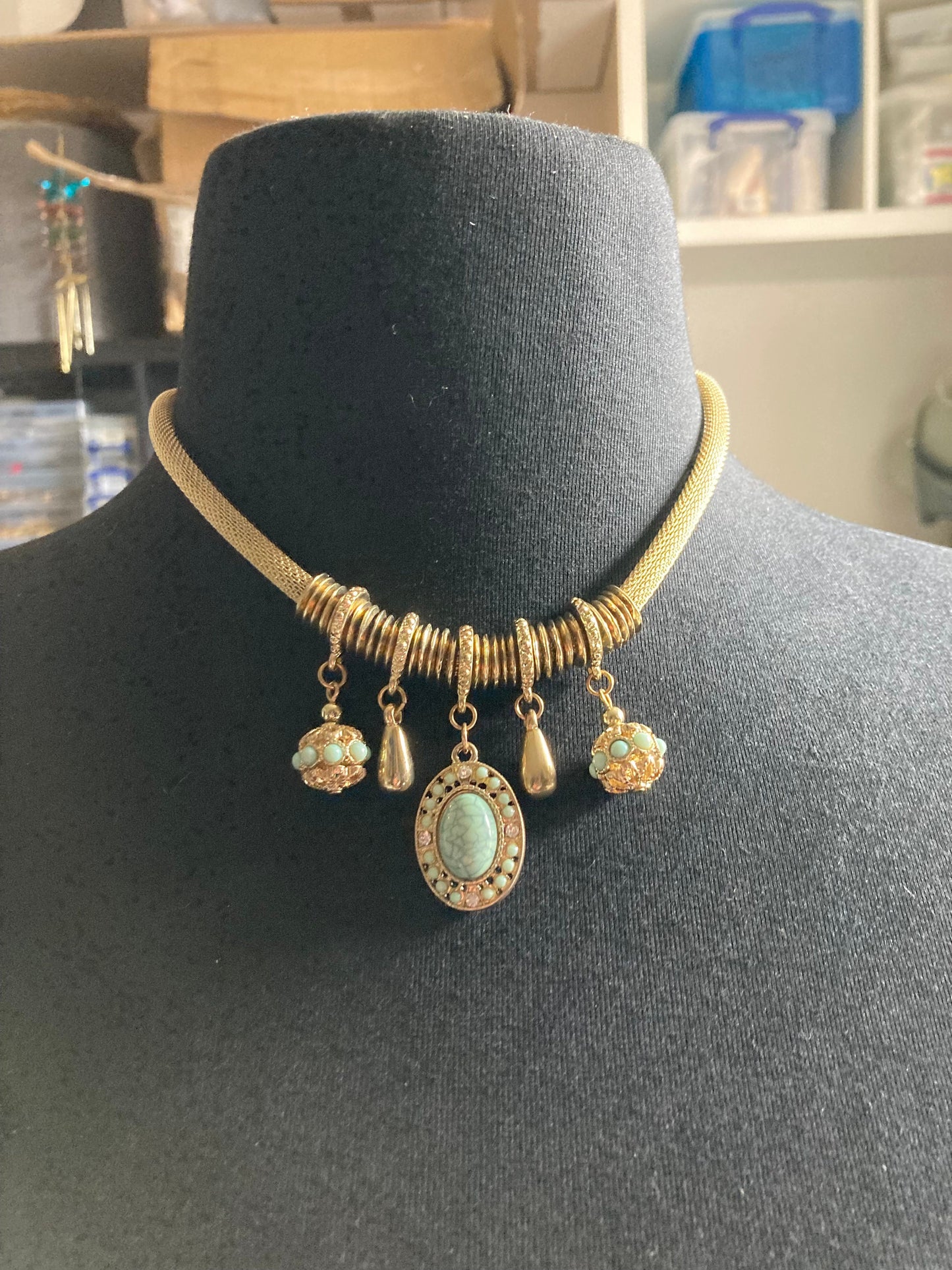 Retro gold tone mesh necklace with turquoise charms with stones