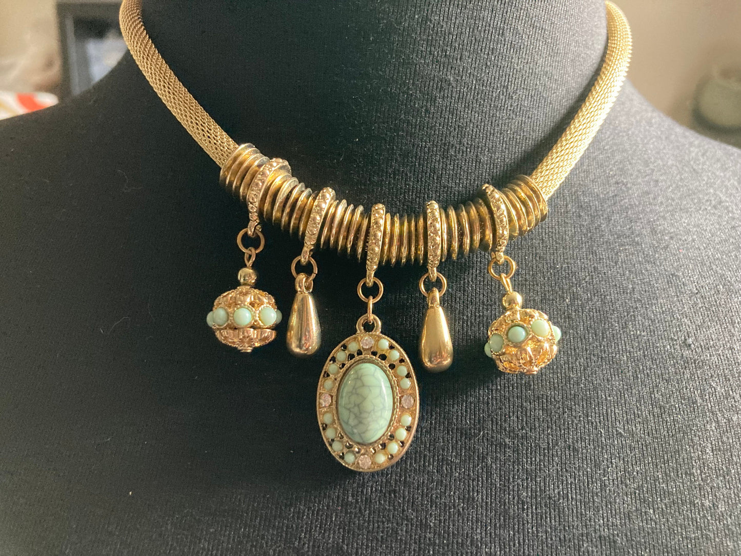 Retro gold tone mesh necklace with turquoise charms with stones