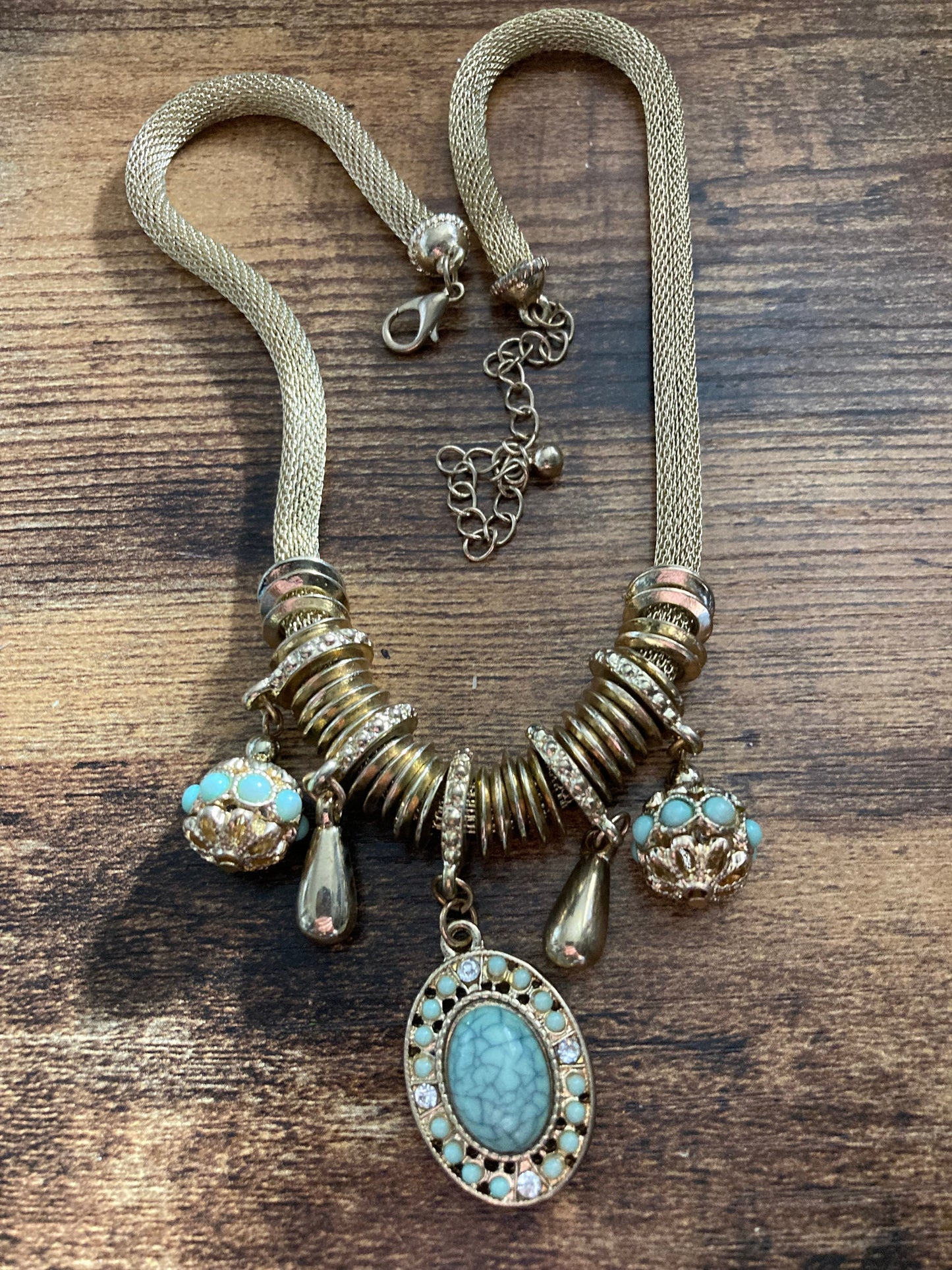 Retro gold tone mesh necklace with turquoise charms with stones