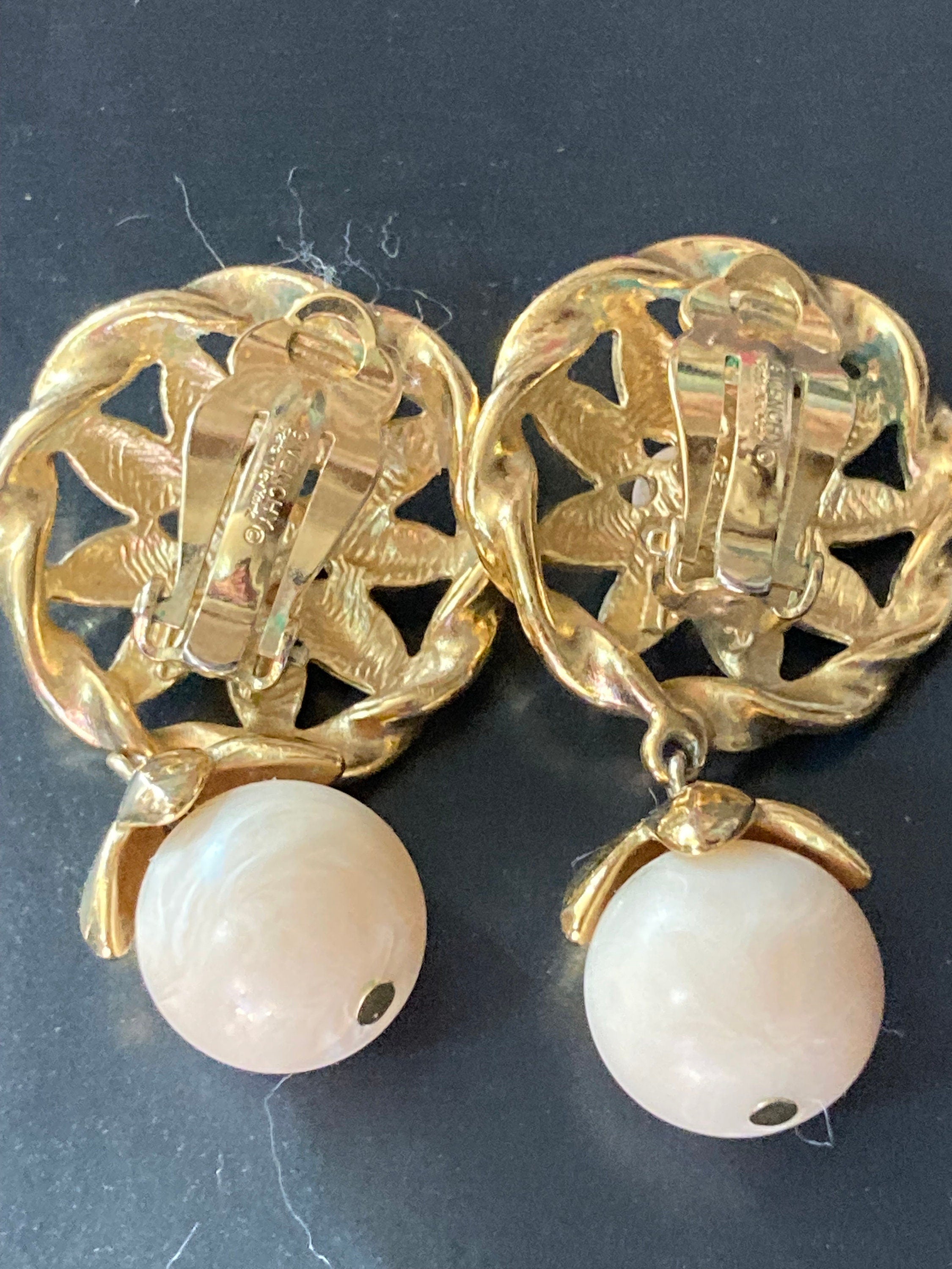 Signed Givenchy oversized neutral cream glass beaded gold dangly drop clip on earrings