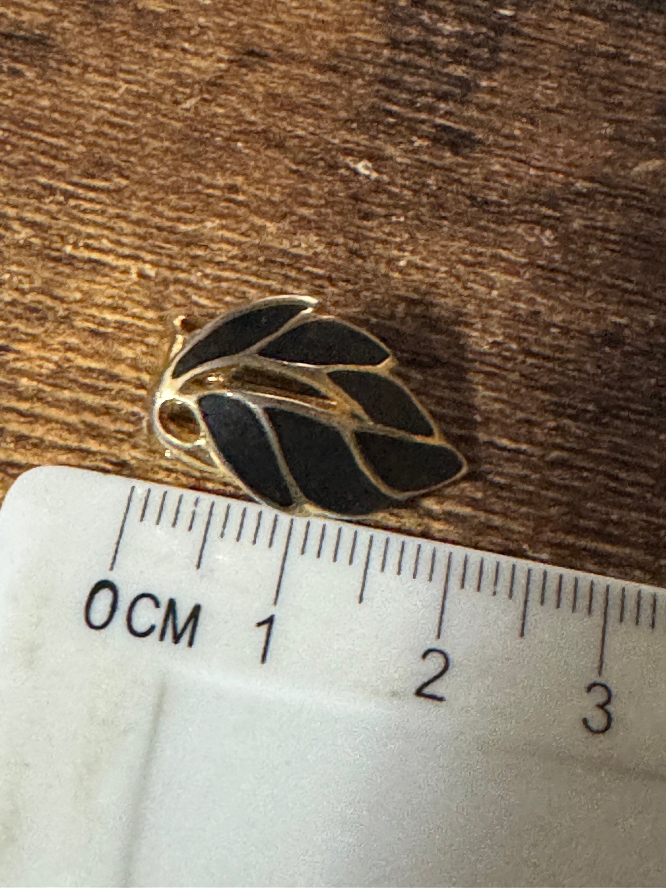 Signed SOLIEL clip on stud Leaf earrings 1980s gold tone black enamel statement designer style