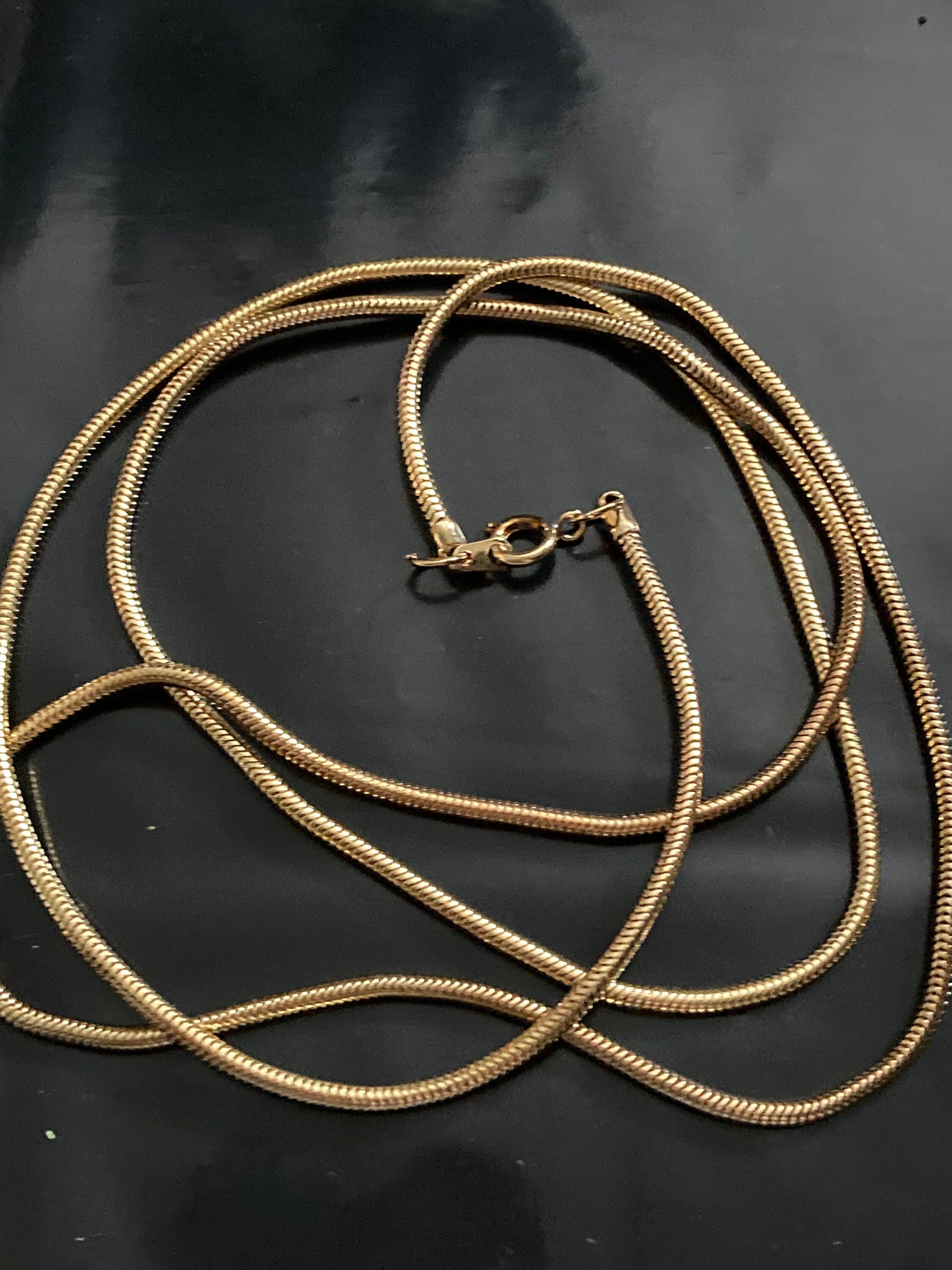 90cm long 1980s thick gold plated round snake chain necklace