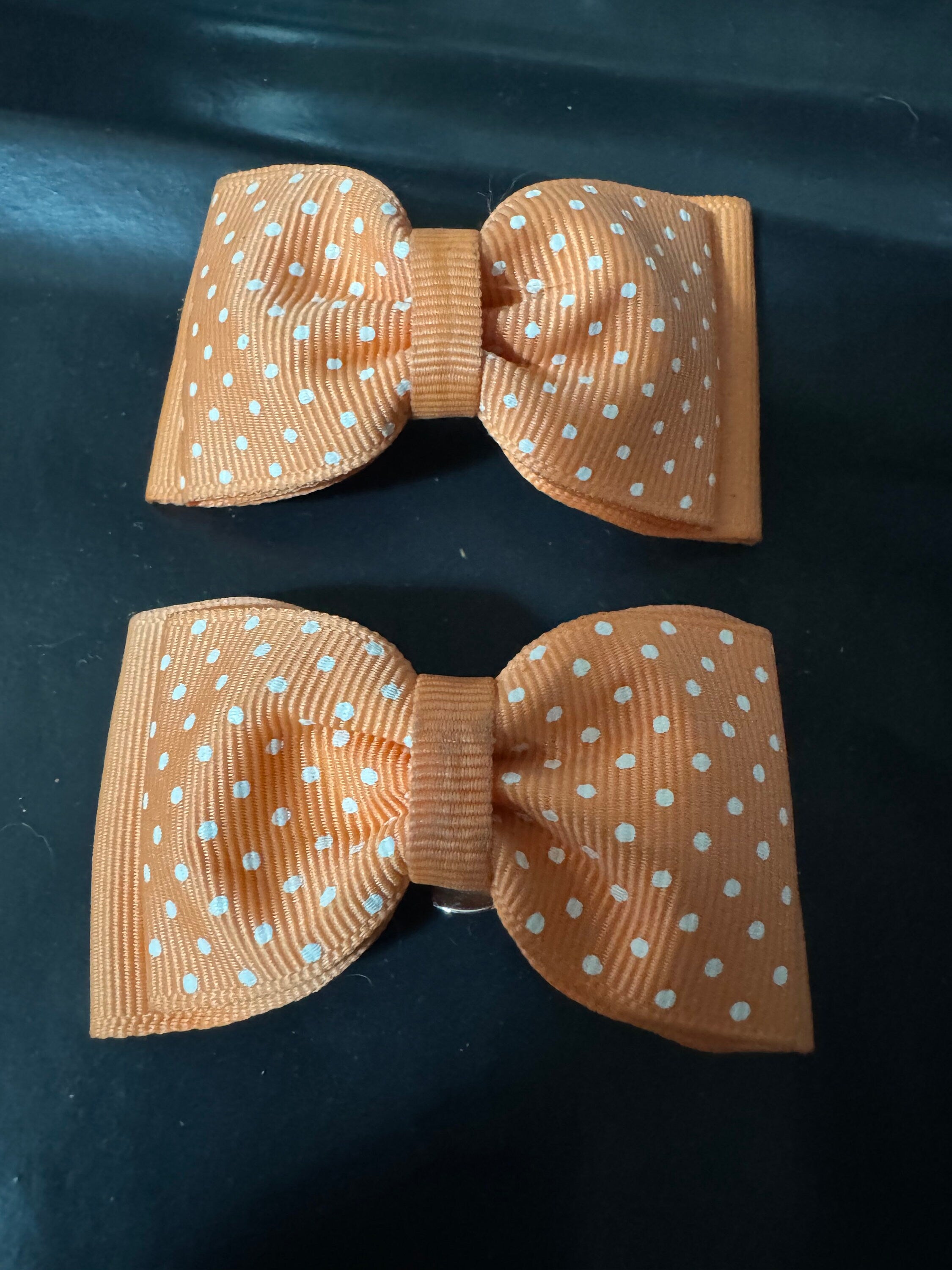 Vintage pair of orange spotty polka dot grosgrain BOW shoe clips