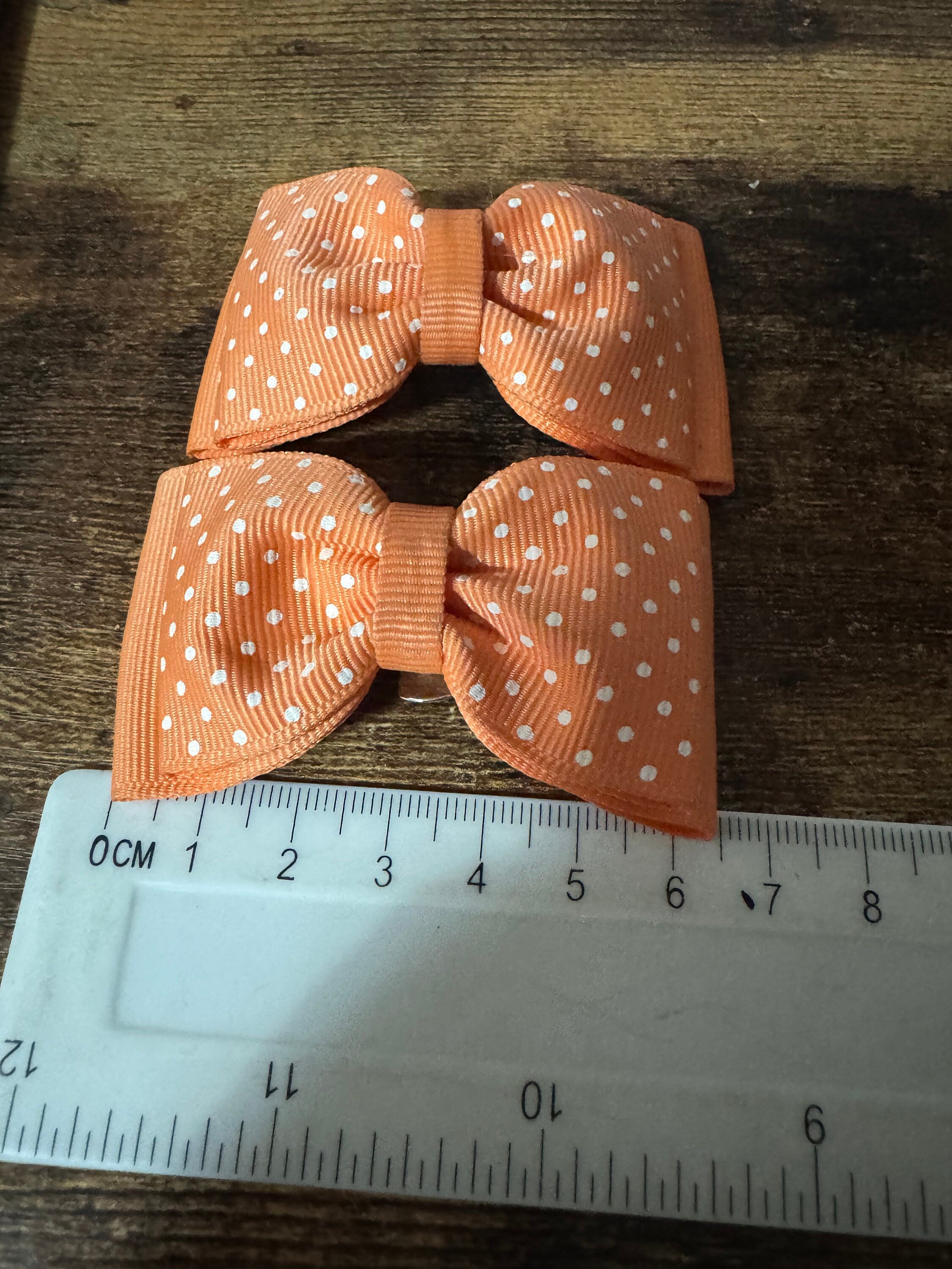 Vintage pair of orange spotty polka dot grosgrain BOW shoe clips