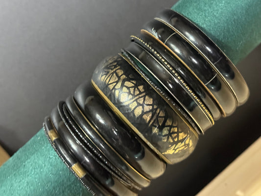 Armful of vintage black and gold tones slim and wide tacking boho bangles