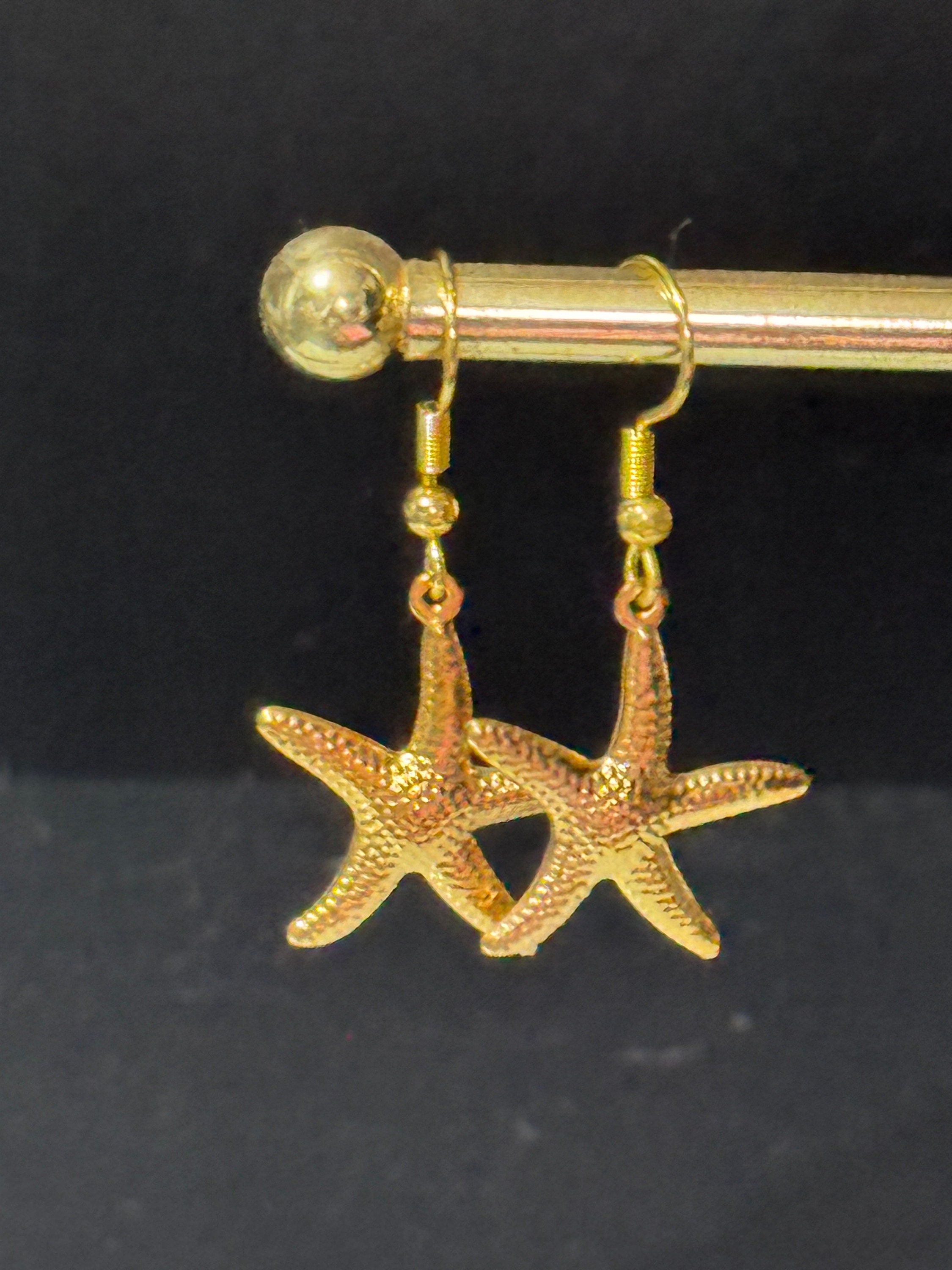 Nautical gold tone starfish small drop earrings pierced ears