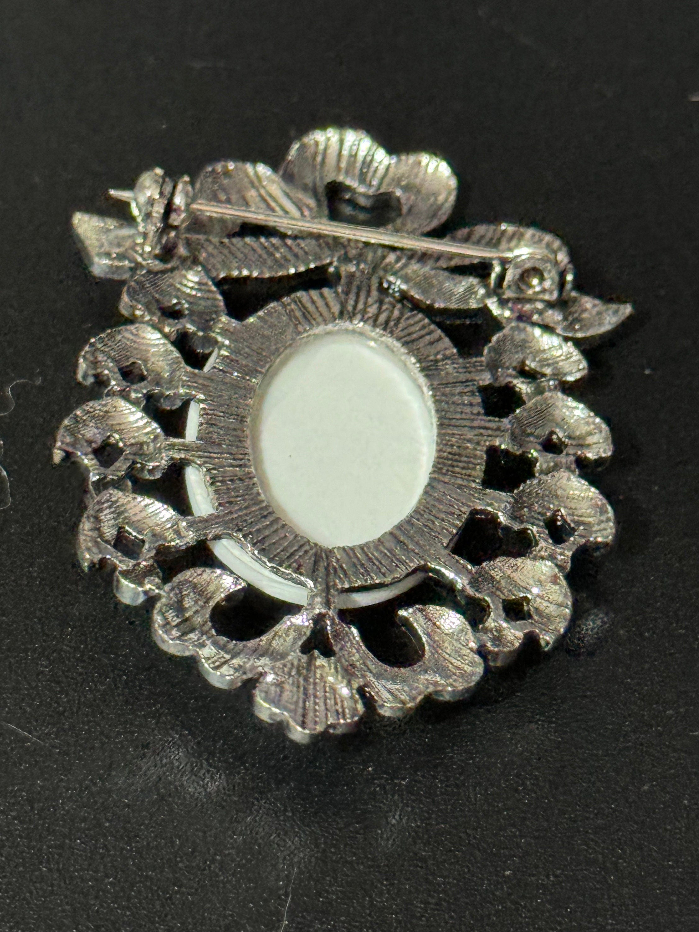 Vintage style handmade white cameo brooch with antique silver tone ornate frame