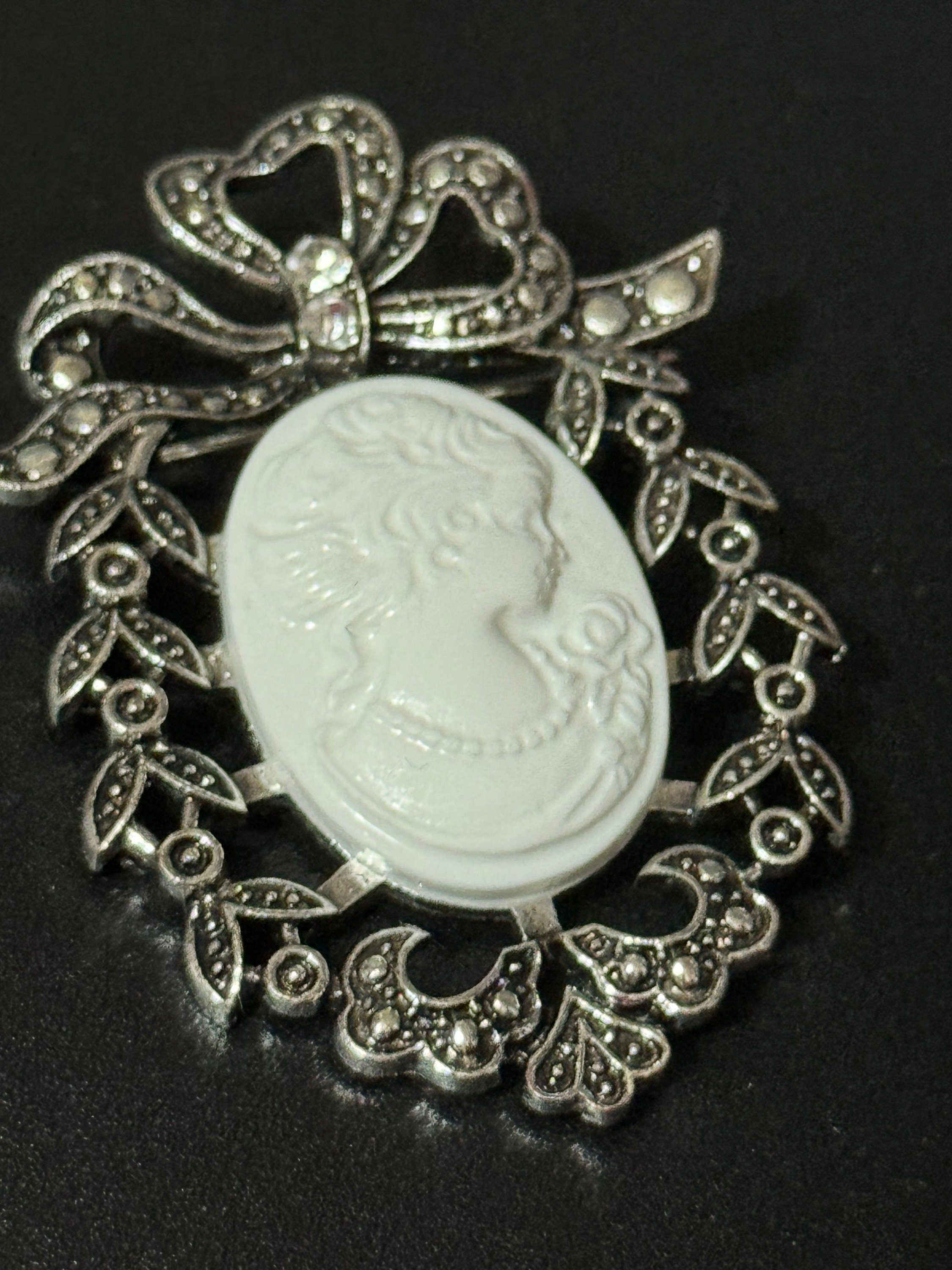 Vintage style handmade white cameo brooch with antique silver tone ornate frame