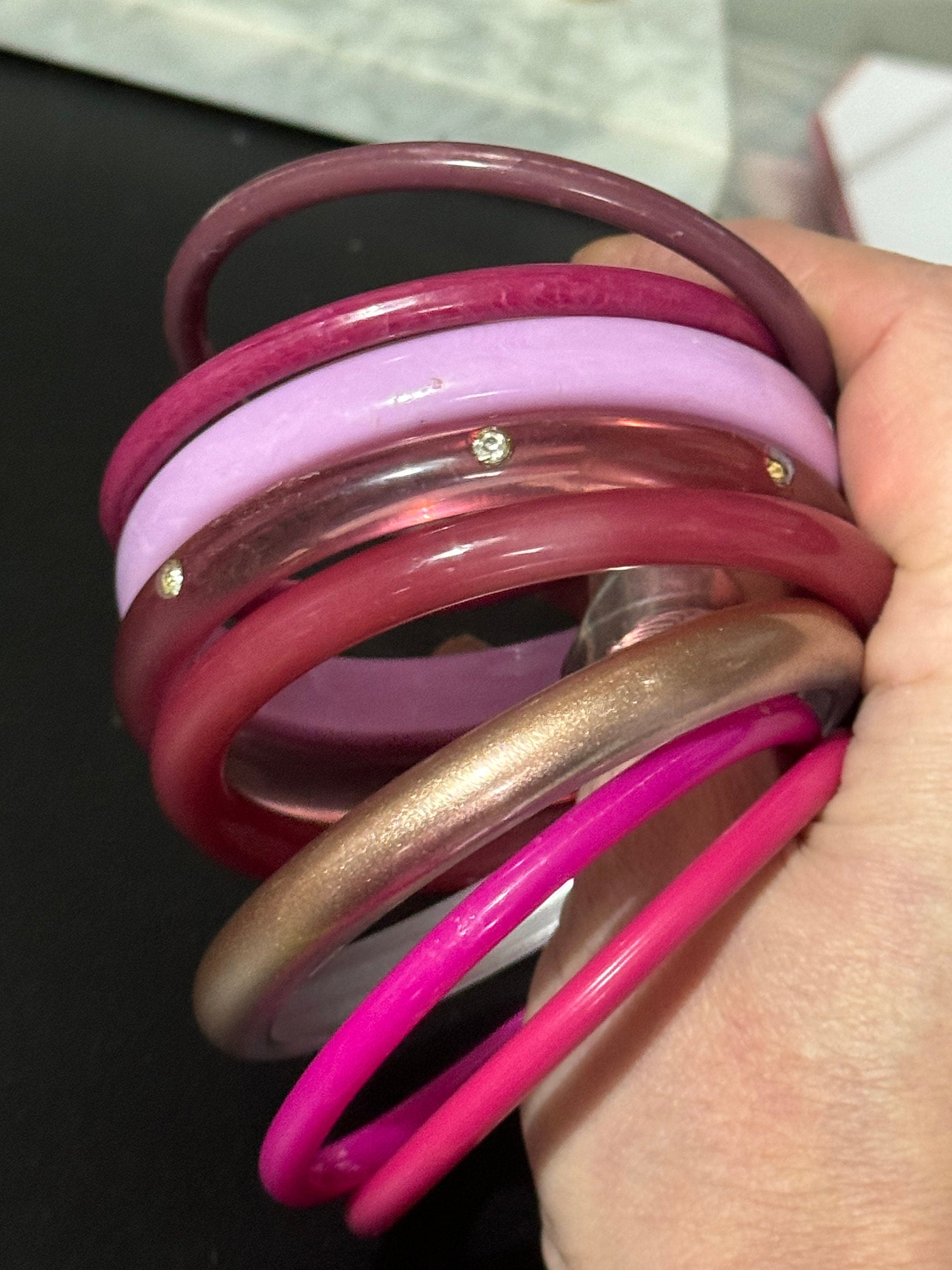 Vintage stack of pink purple plastic bangles retro acrylic bracelets