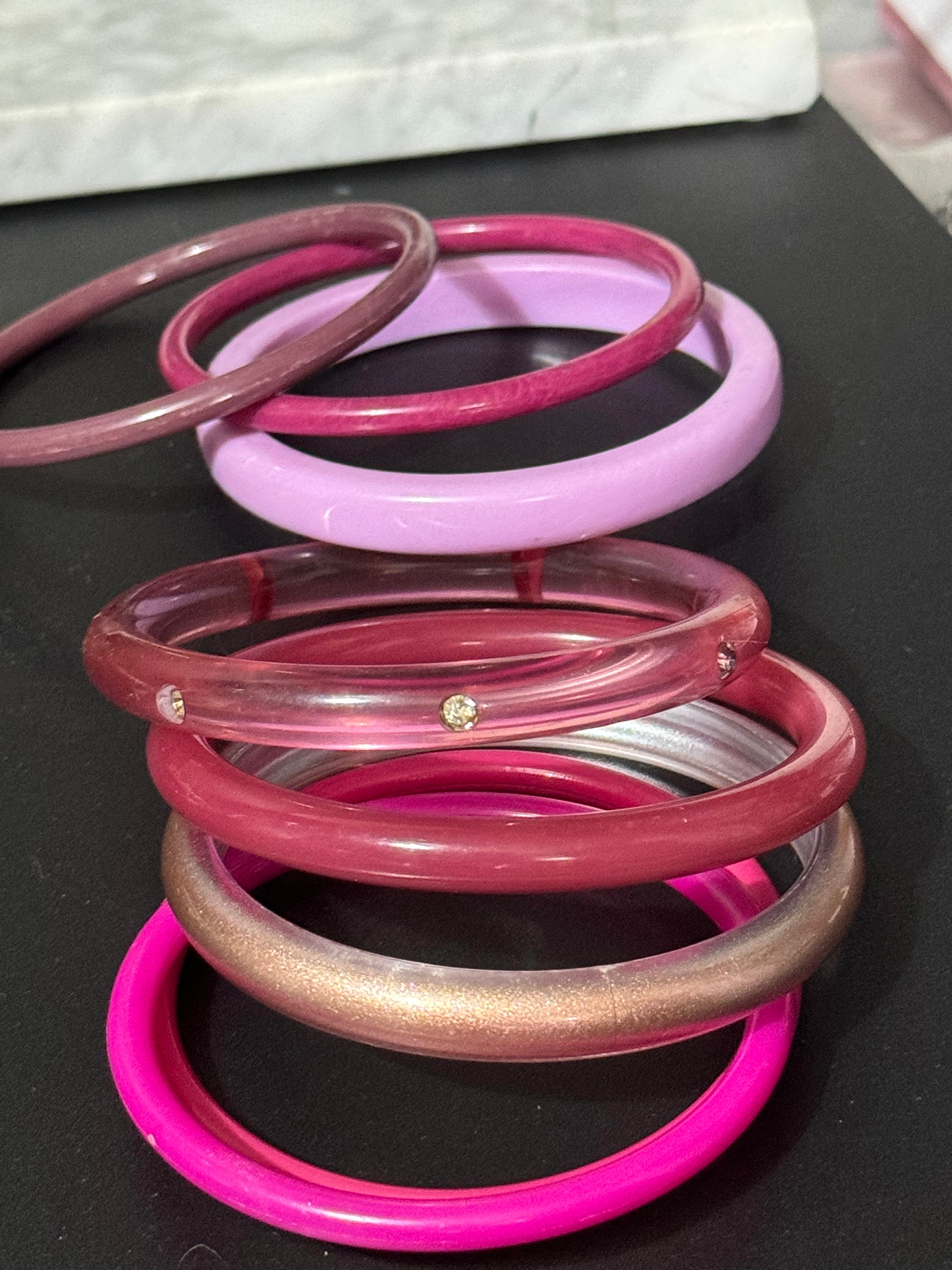 Vintage stack of pink purple plastic bangles retro acrylic bracelets