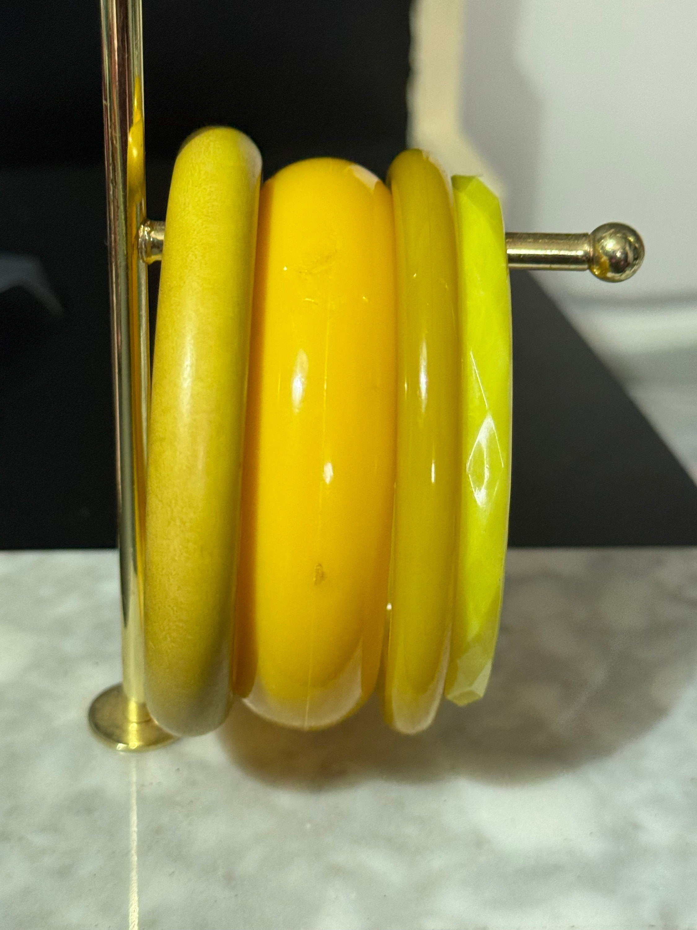 Vintage stack of YELLOW plastic bangles retro acrylic bracelets