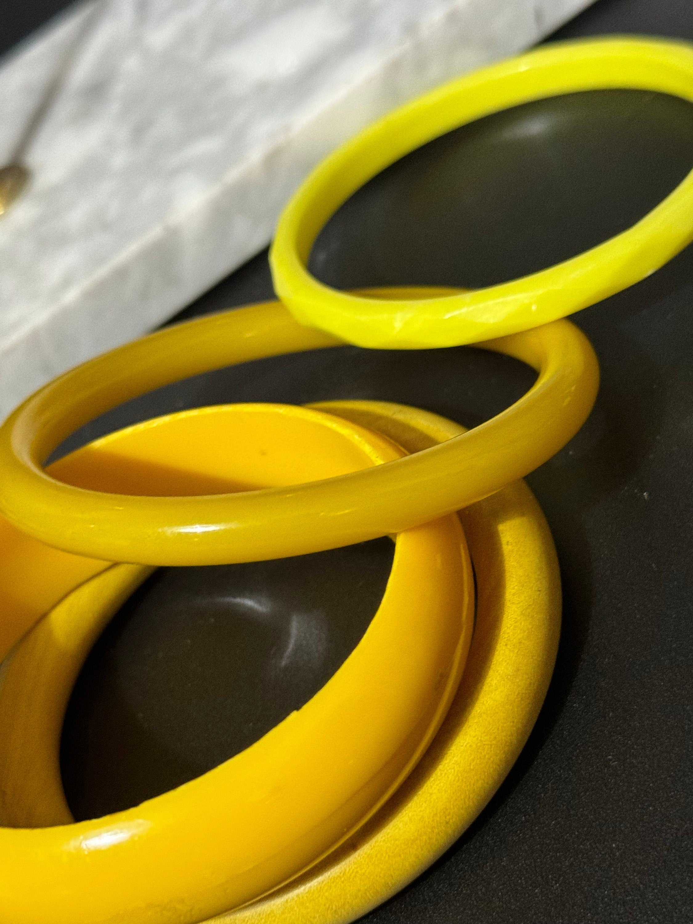 Vintage stack of YELLOW plastic bangles retro acrylic bracelets