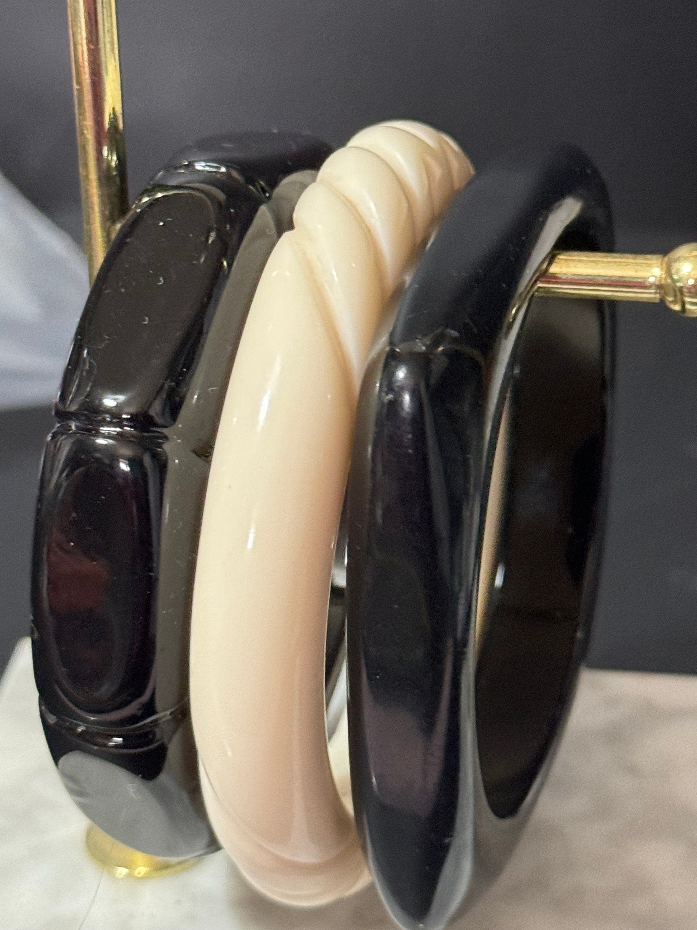 Vintage stack of black and cream Chunky stylish plastic bangles retro acrylic bracelets