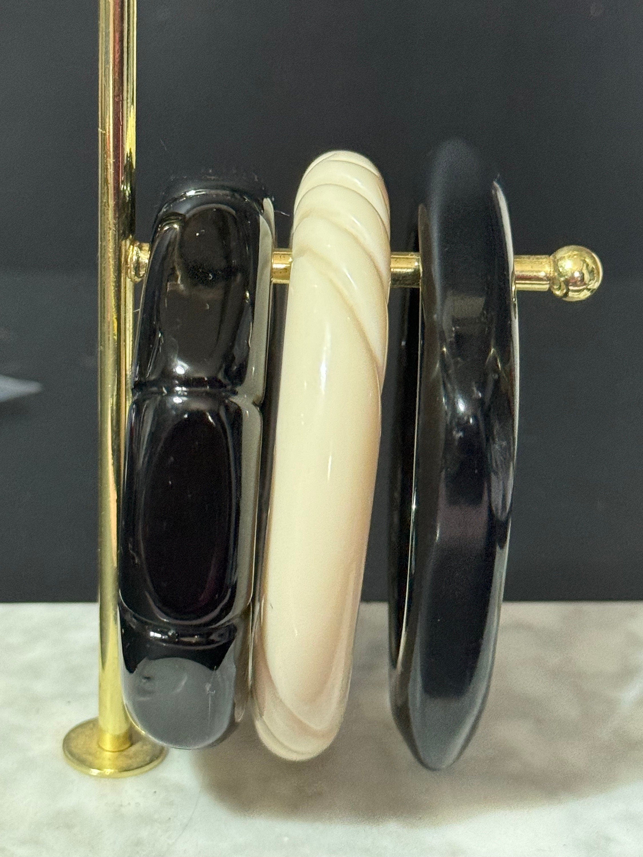 Vintage stack of black and cream Chunky stylish plastic bangles retro acrylic bracelets