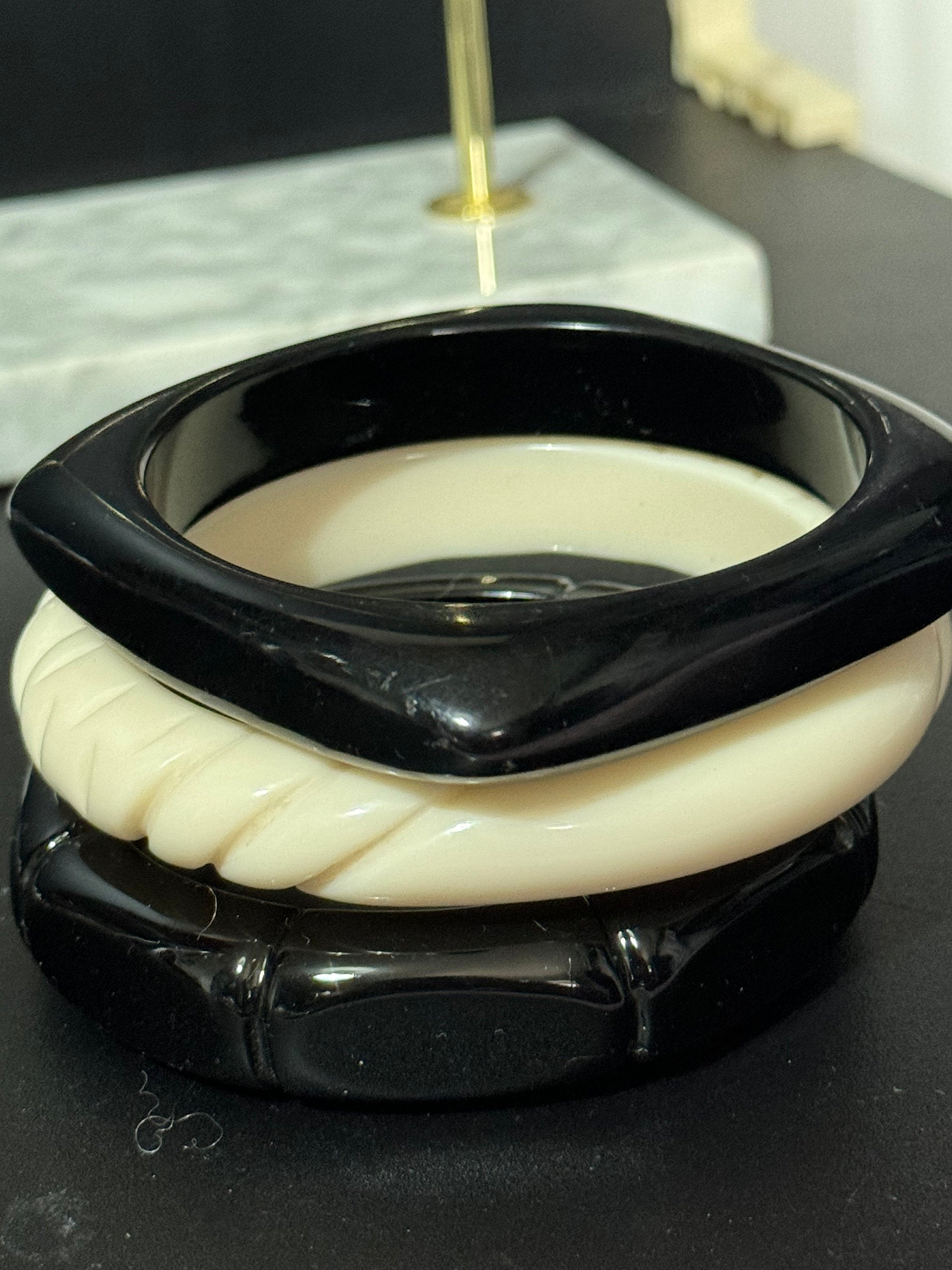 Vintage stack of black and cream Chunky stylish plastic bangles retro acrylic bracelets