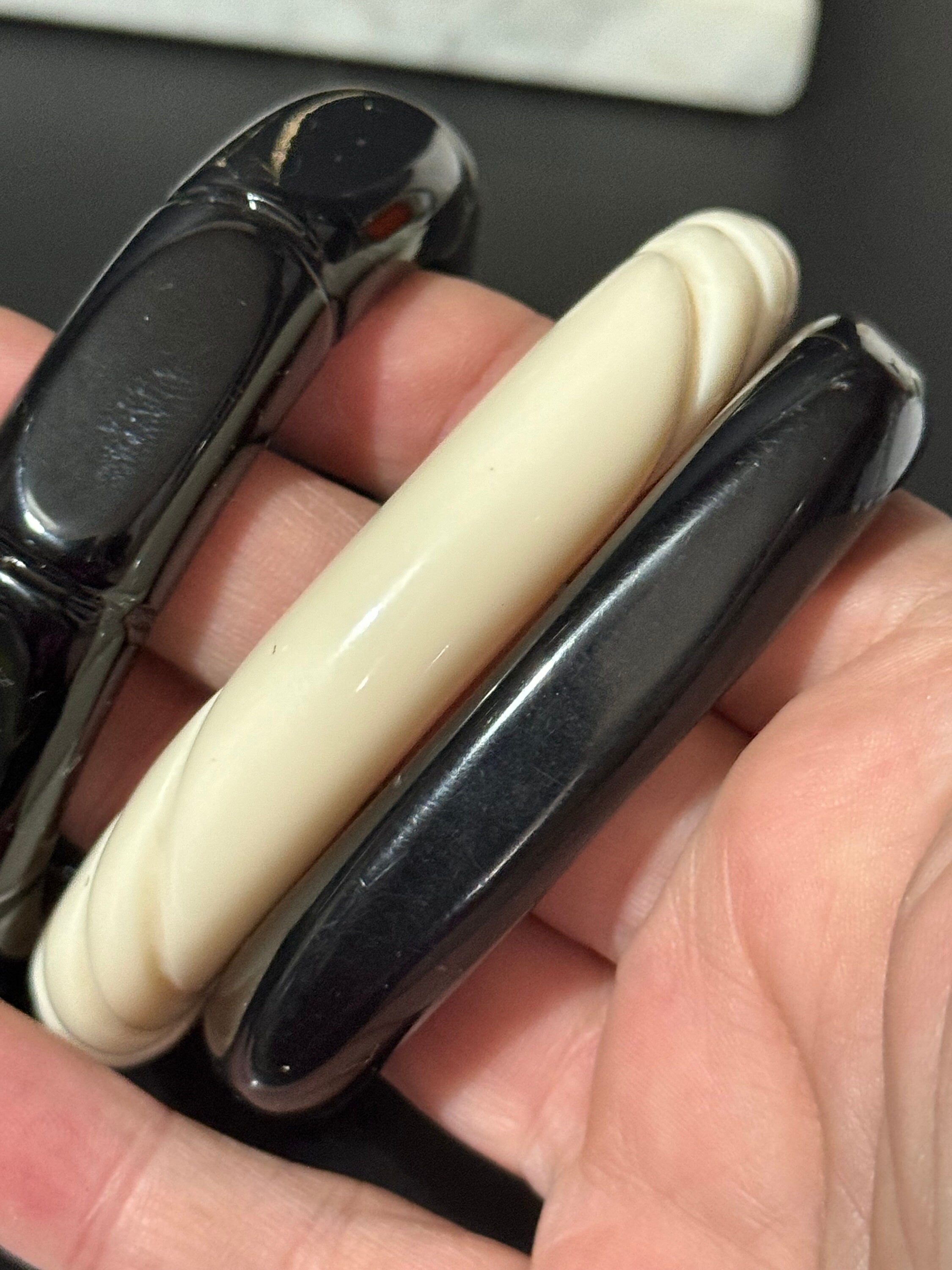 Vintage stack of black and cream Chunky stylish plastic bangles retro acrylic bracelets