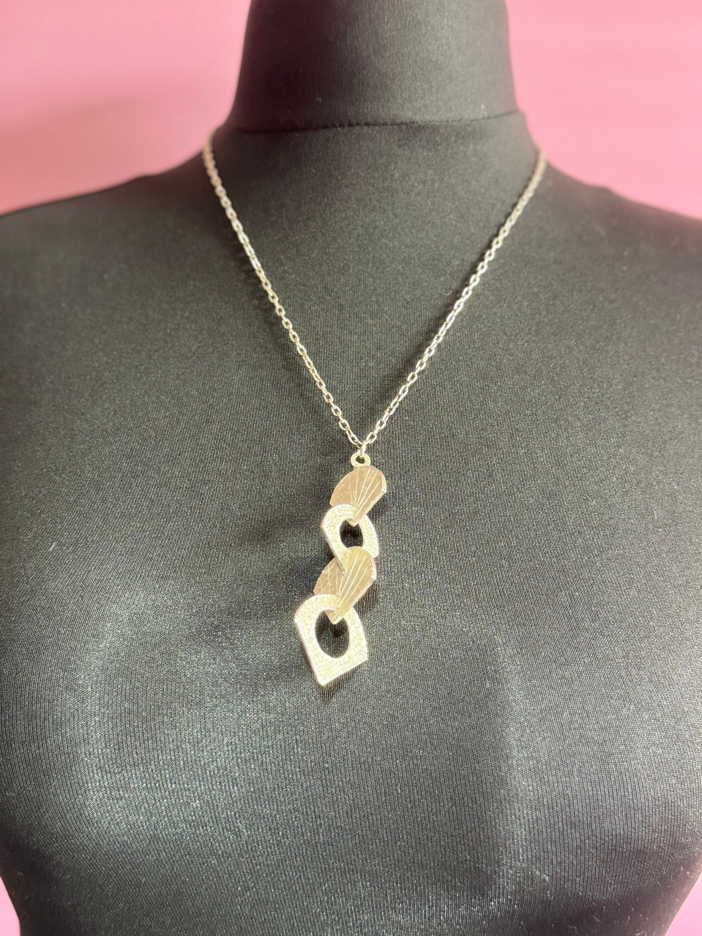 vintage Modernist silver tone metal pendant necklace on a chain Mid Century Modern