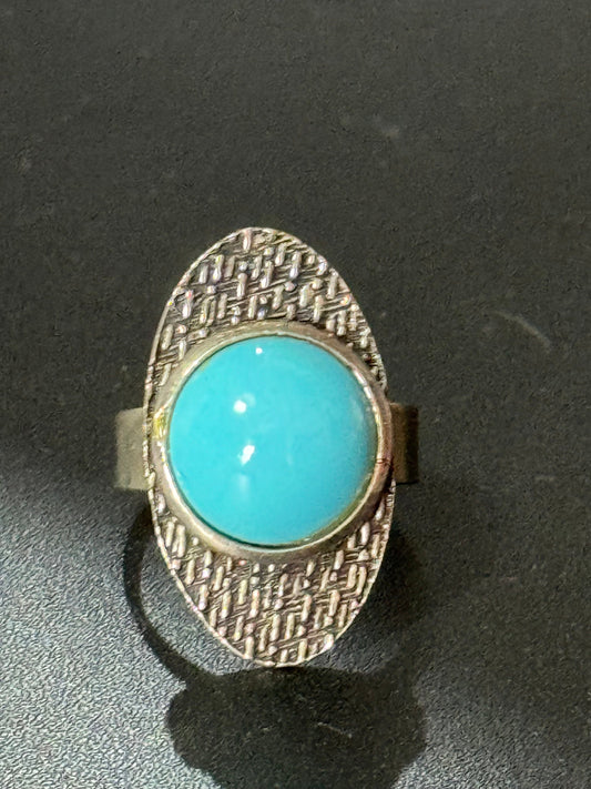 modernist stainless steel adjustable ring with central turquoise cabochon 1970s vintage