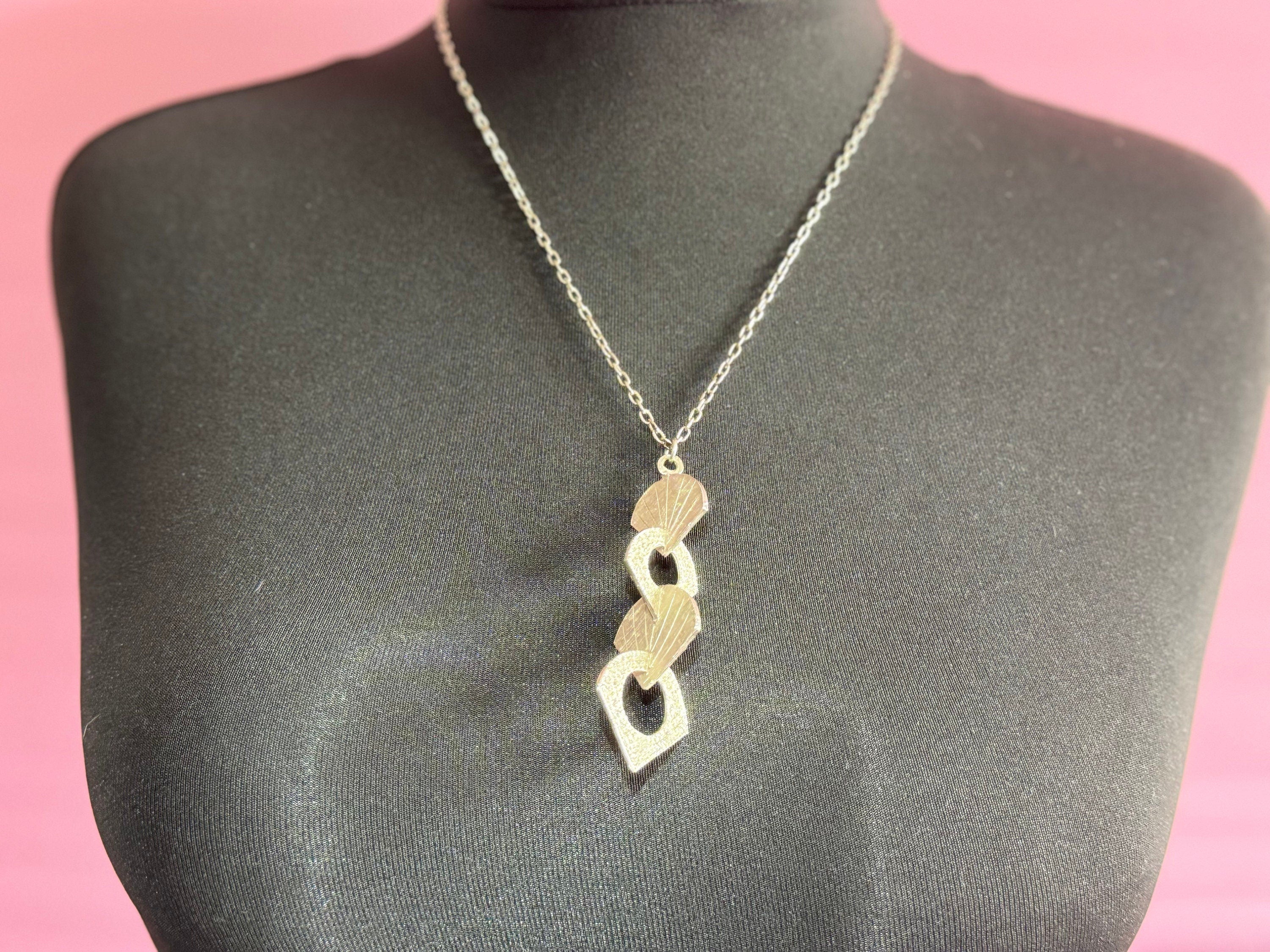 vintage Modernist silver tone metal pendant necklace on a chain Mid Century Modern